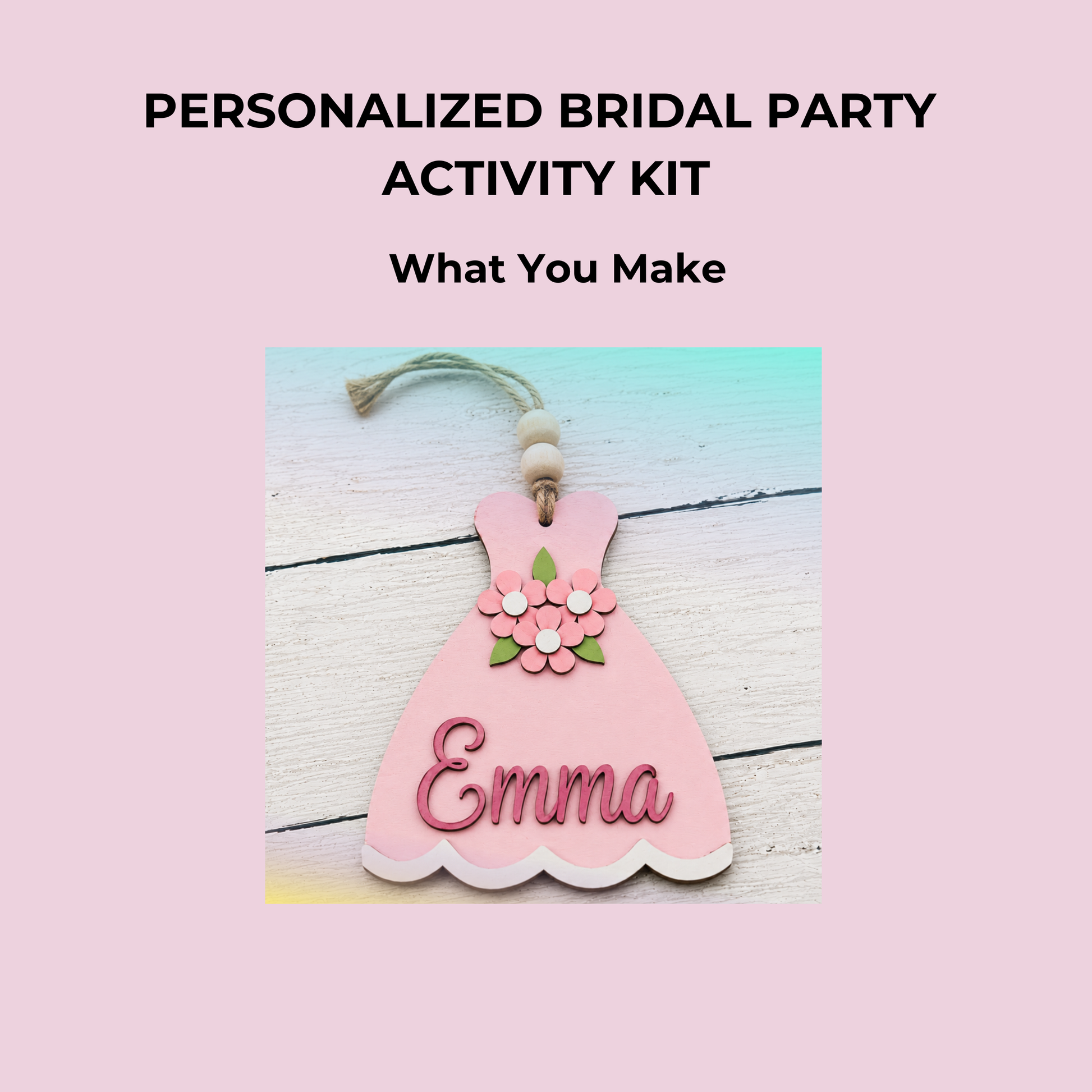 A pink wooden dress ornament with floral details and the name “Emma,” on a light wood background. Text above: “Mirabilia Boutique Personalized Bridal Party Activity Kit—create a fun bridal shower keepsake or custom luggage tag.”.
