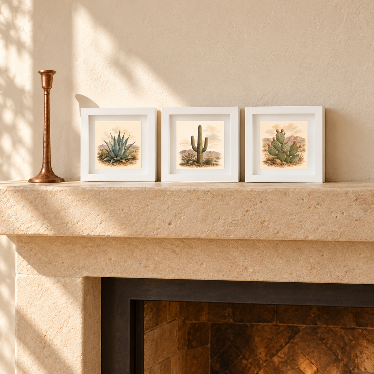 The Built to Endure Botanical Shadowbox Trio | Sage & Stone by Mirabilia Boutique sits on a stone mantel beside a copper candlestick, sunlight casting soft shadows on the beige textured wall behind.