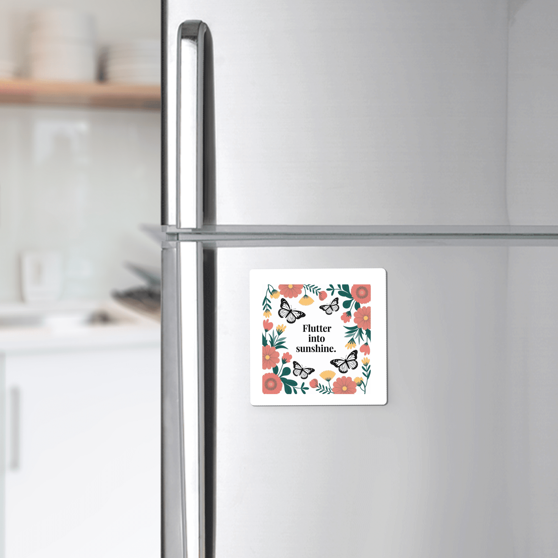The Mirabilia Boutique Flutter into Sunshine Magnet – Butterfly & Floral Joy adds uplifting charm to a stainless steel refrigerator in a modern kitchen.