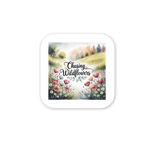 A square Chasing Wildflowers Magnet by Mirabilia Boutique features vibrant wildflowers, a meadow, and sky—perfect fridge decor or a nature gift for outdoor lovers. Script quote adds botanical charm to any space.