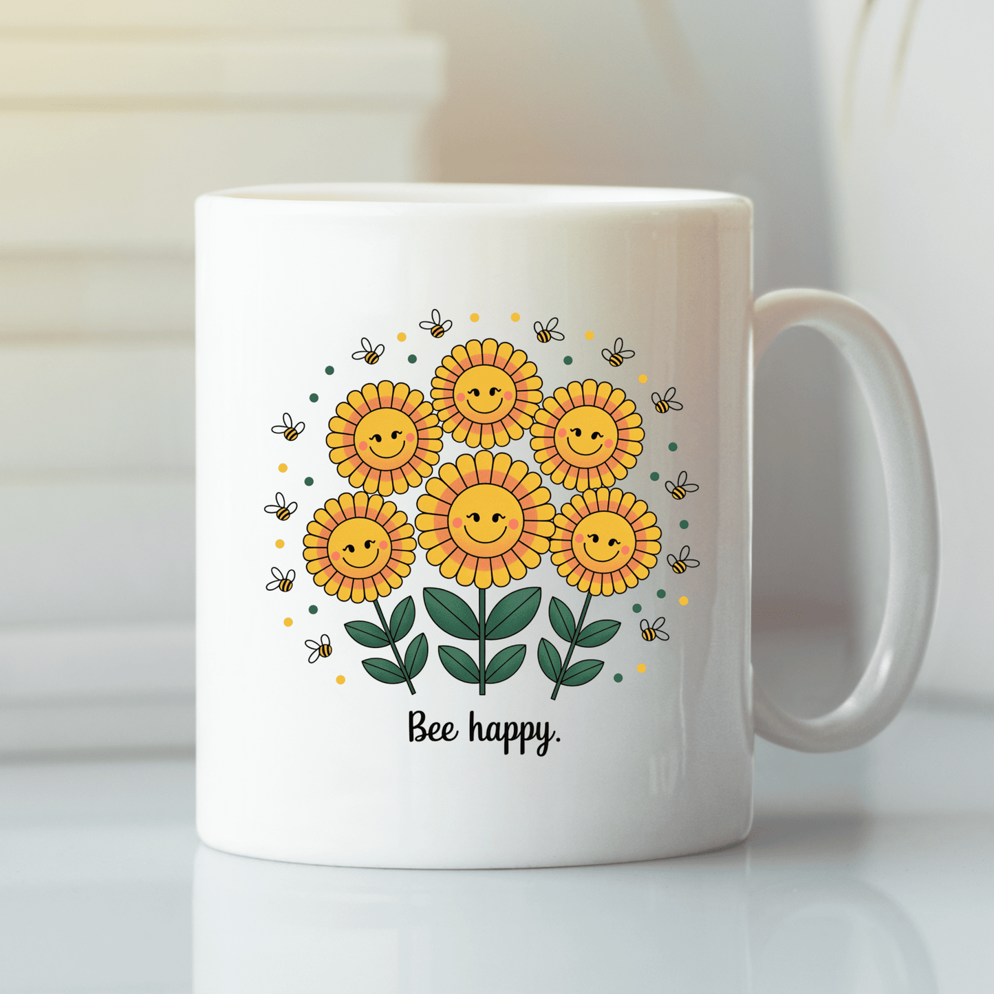 The Bee Happy Mug – Cheerful Sunflowers & Summer Joy from Mirabilia Boutique features six smiling sunflowers, buzzing bees, and “Bee happy.” printed below the illustration—making it a perfect cheerful gift.