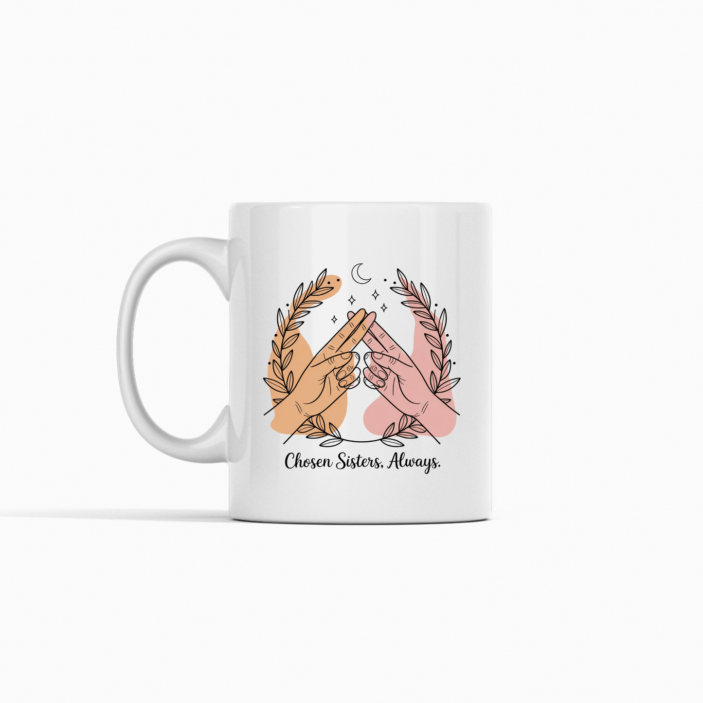The Best Friend Mug by Mirabilia Boutique features "Chosen Sisters Always"—a white mug with touching hands inside a leafy wreath and stars, making it the perfect Galentine’s gift for your best friend.