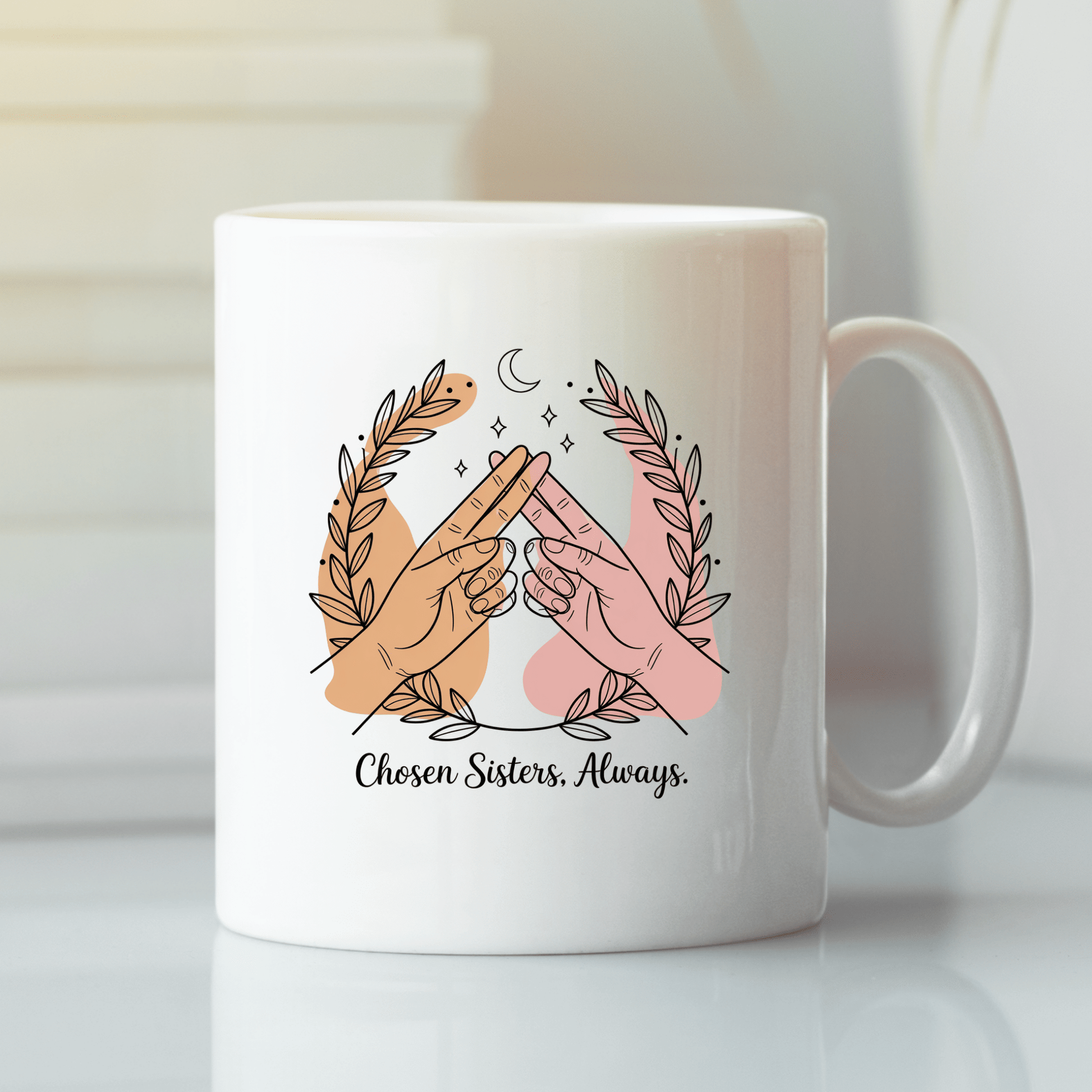 The Best Friend Mug by Mirabilia Boutique features two hands making a pinky promise, leafy branches, stars, and a crescent moon, with "Chosen Sisters, Always"—a perfect Galentine’s gift for your best friend.