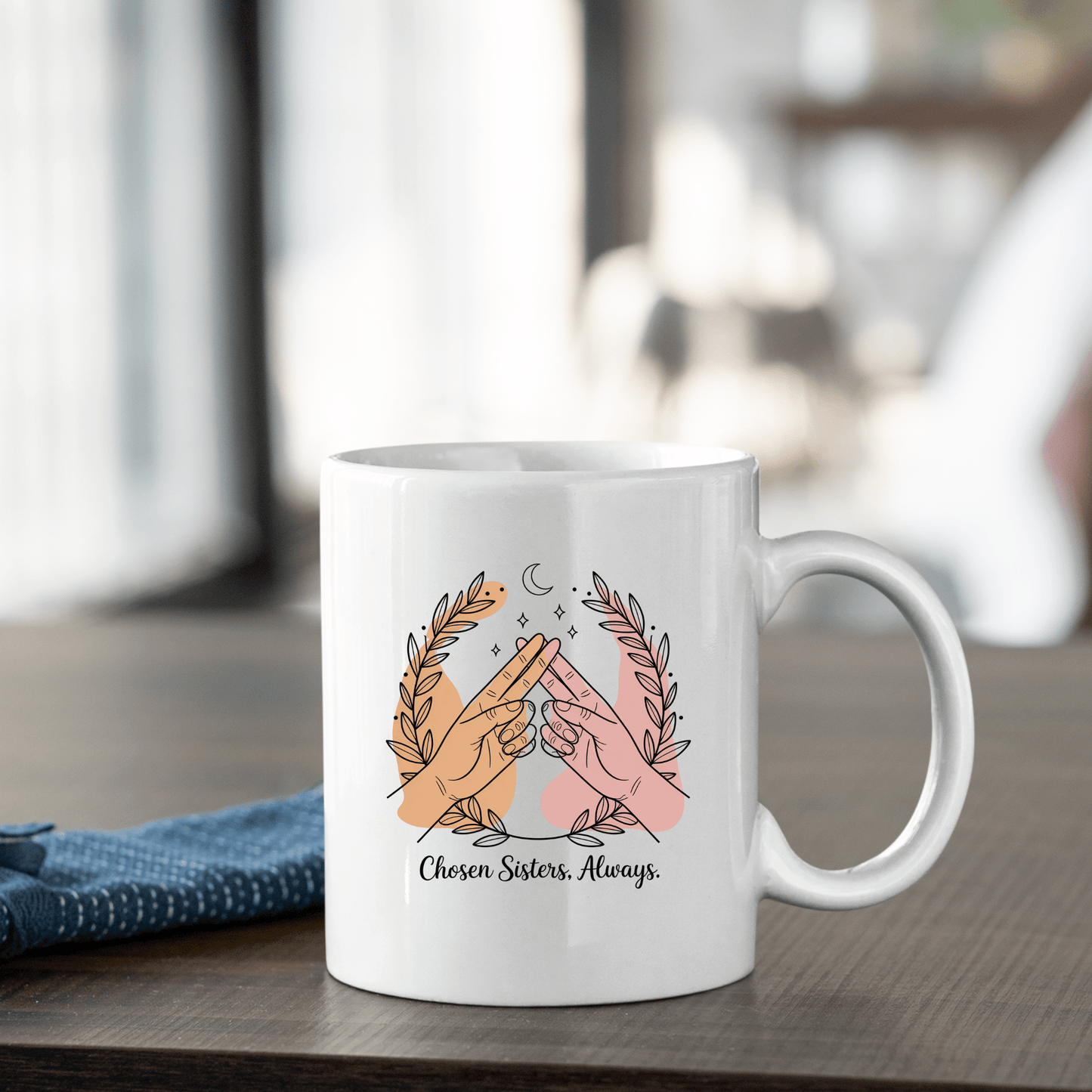 The Best Friend Mug from Mirabilia Boutique features two hands making a pinky promise and leafy branches with "Chosen Sisters. Always."—a perfect Galentine’s gift or friendship mug.