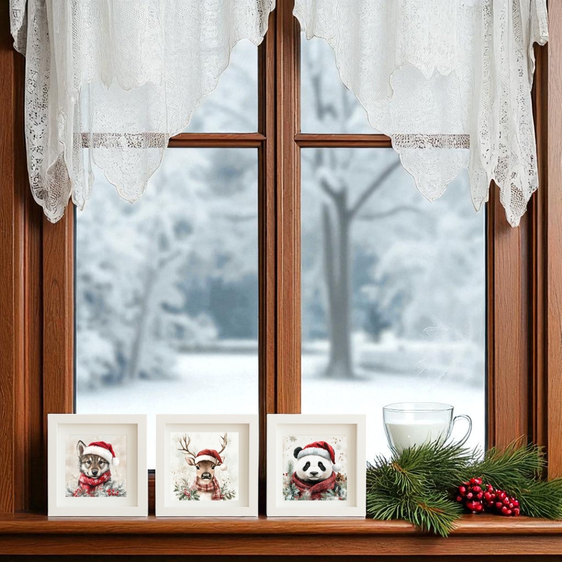 A wooden window overlooks a snowy scene. On the sill sits the Mirabilia Boutique Wolf, Deer & Panda Christmas Trio 5x5 Holiday Shadowbox Set, beside a cup of milk and a pine branch with red berries.