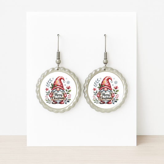 Mirabilia Boutique’s Merry Christmas Christmas Gnome Earrings feature a festive gnome in a red hat with holly and florals, scalloped edges, and “Merry Christmas”—the perfect holiday jewelry gift. Displayed on a white background.