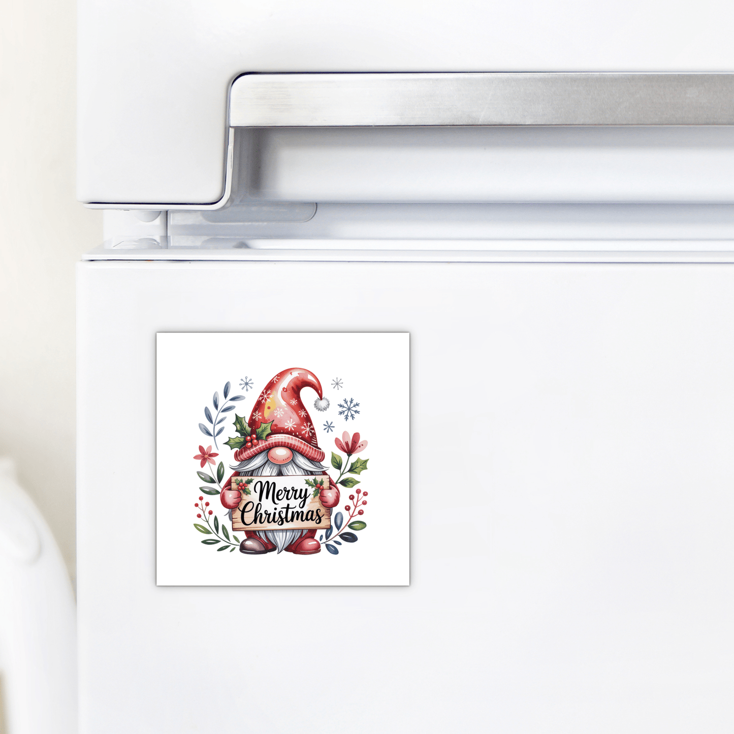 The Merry Christmas Gnome Magnet by Mirabilia Boutique features a festive gnome in a red hat on your fridge—a charming holiday decor piece or cute stocking stuffer for the season.