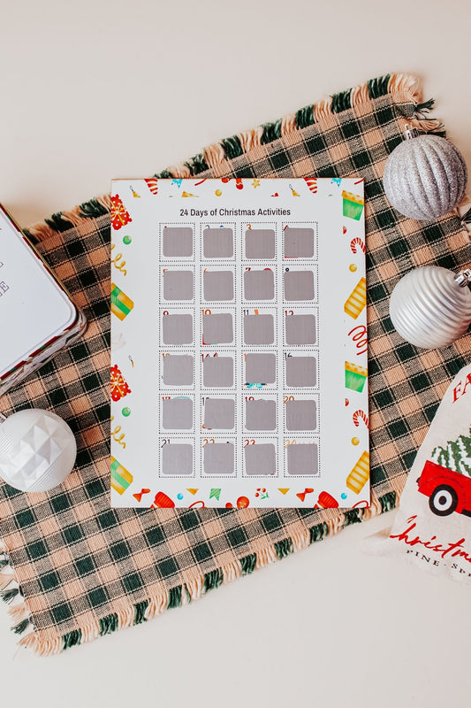 The Mirabilia Boutique Scratch-Off Christmas Activity Calendar features 25 festive family activities for kids and serves as a fun holiday countdown and winter bucket list poster.