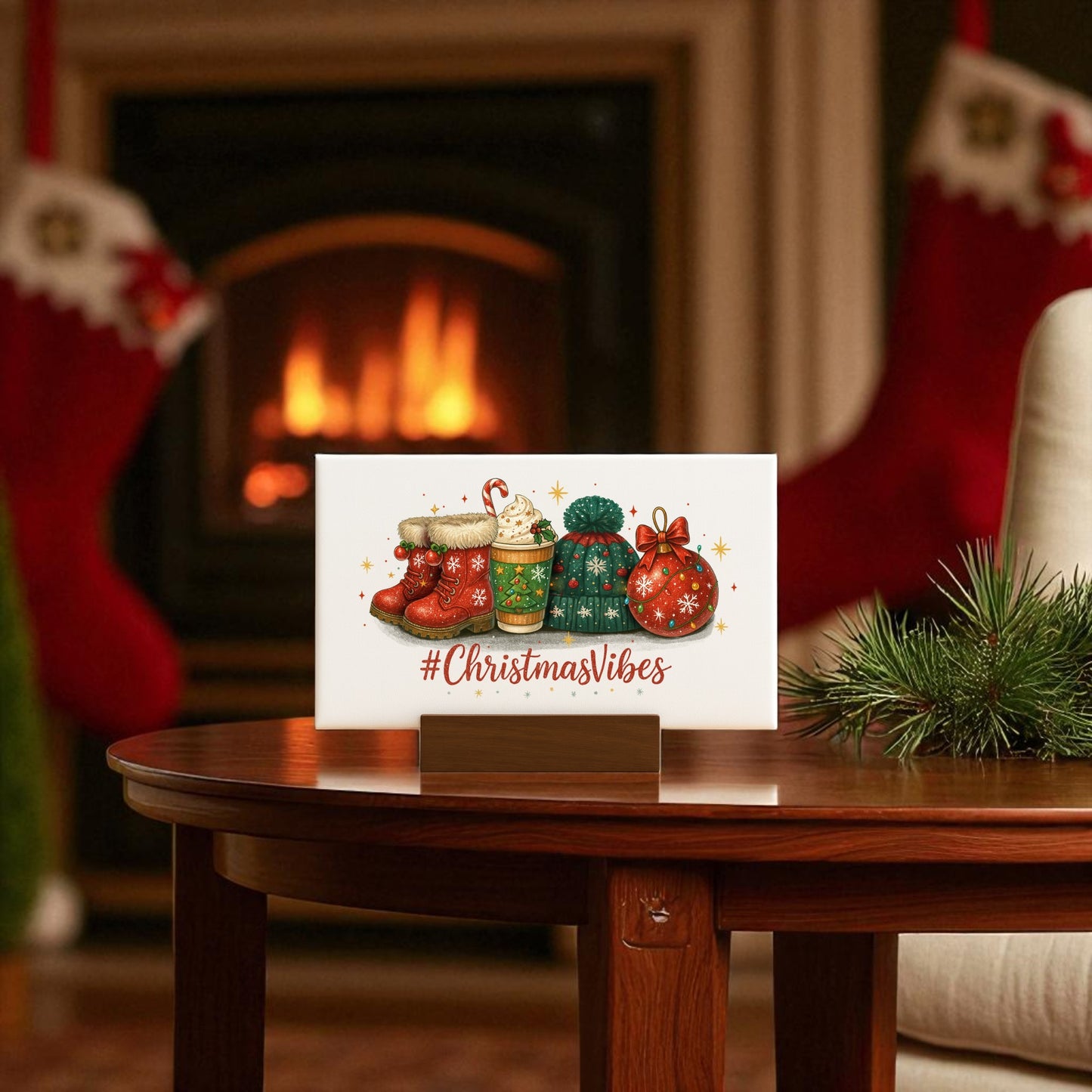 The Mirabilia Boutique Christmas Vibes 6x4 Canvas Sign features festive stockings and gifts on a wooden table by a glowing fireplace, with "#ChristmasVibes" text and cheerful decor—perfect holiday decor for your home.