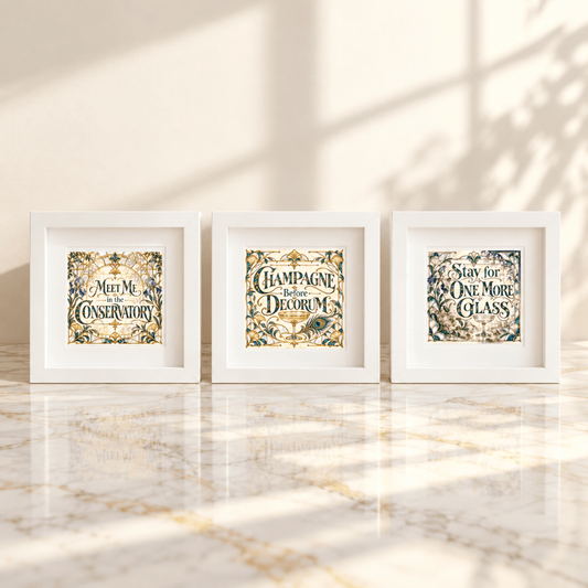 Elevate your space with the Conservatory After Hours 5x5 Shadowbox Trio by Mirabilia Boutique, part of the Gilded Reverie collection. Featuring three framed prints adorned with floral borders—each reading “Meet Me in the Conservatory,” “Champagne Before Decorum,” and “Stay for One More Glass”—this trio brings sophisticated charm to home bar decor. Displayed on a marble surface, sunlit shadows cascade across the arrangement, enhancing its depth and elegance.