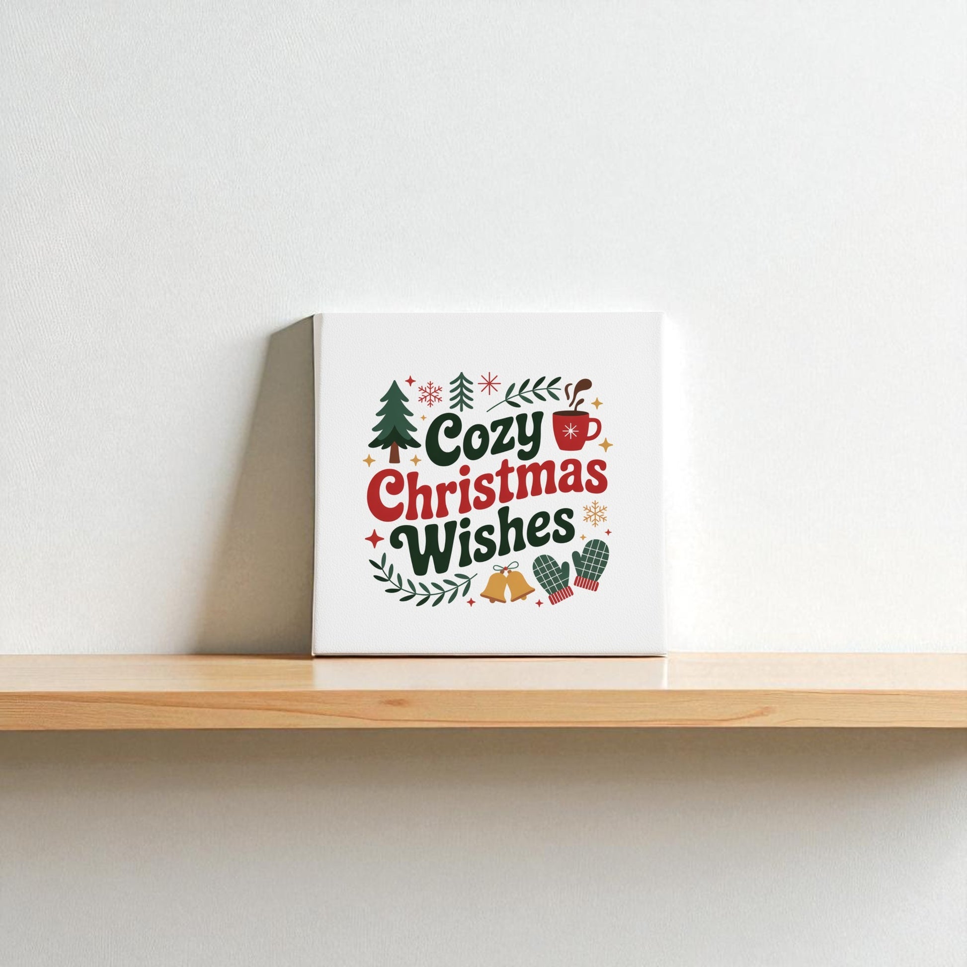 The Mirabilia Boutique Cozy Christmas Wishes Canvas (8x8) features festive art and "Cozy Christmas Wishes"—a charming holiday wall decor piece perfect for any space.