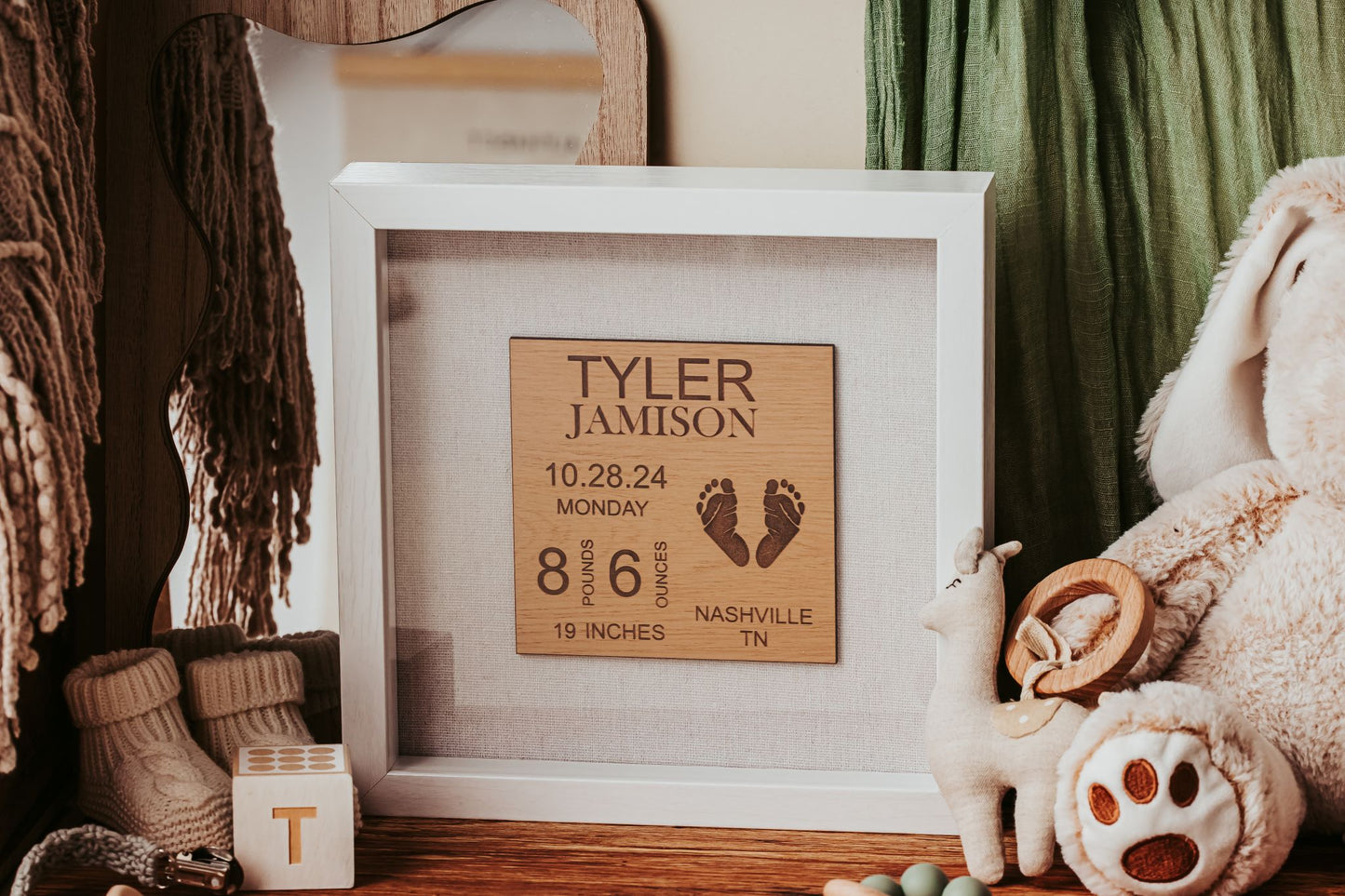 The Mirabilia Boutique Personalized Baby Birth Stats Shadowbox, a 9x9 laser engraved keepsake, displays custom newborn details and footprints—a heartfelt nursery gift and unique name sign for new parents.