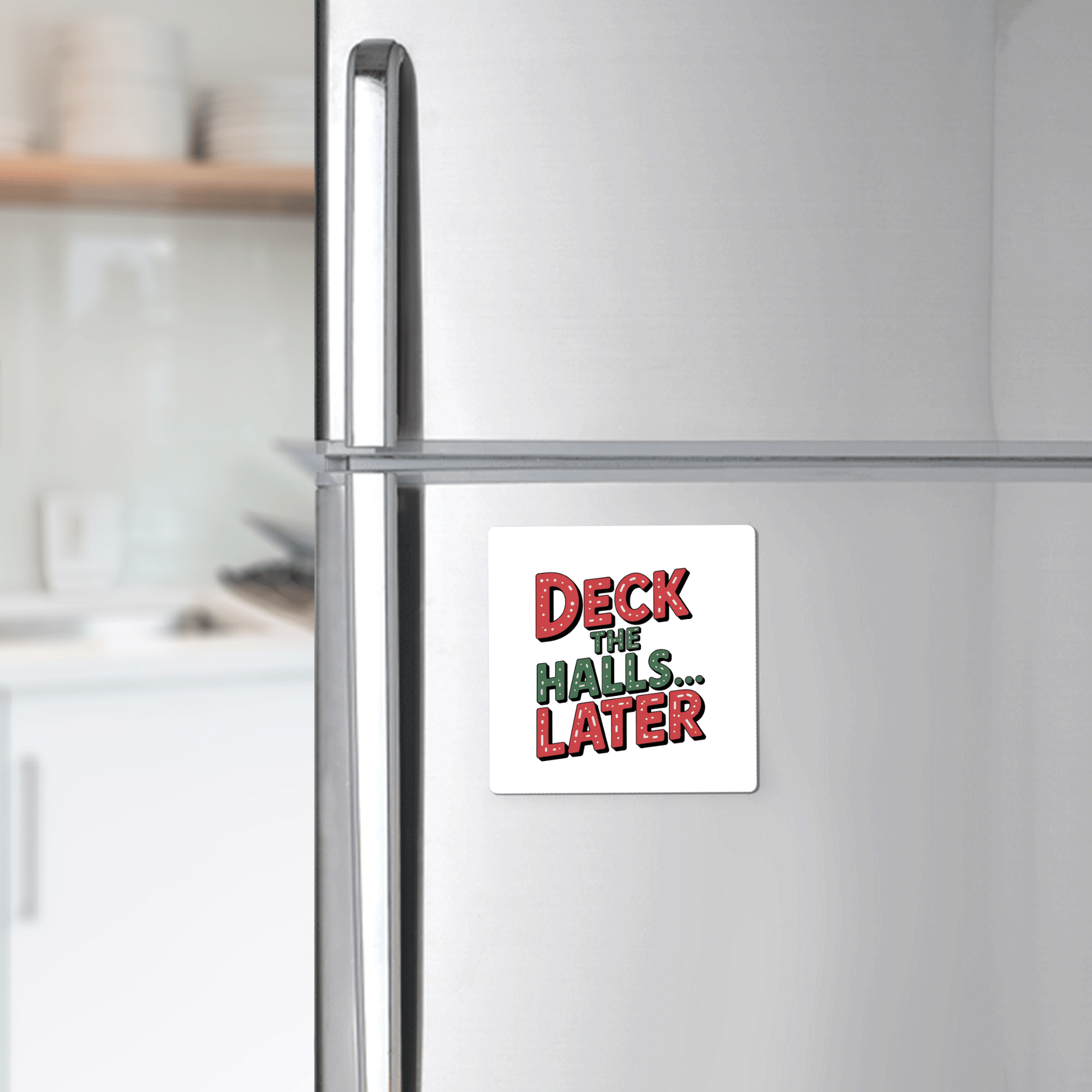 A bright kitchen features a refrigerator with the Mirabilia Boutique Deck The Halls... Later Magnet, a funny Christmas gift idea in festive red and green.