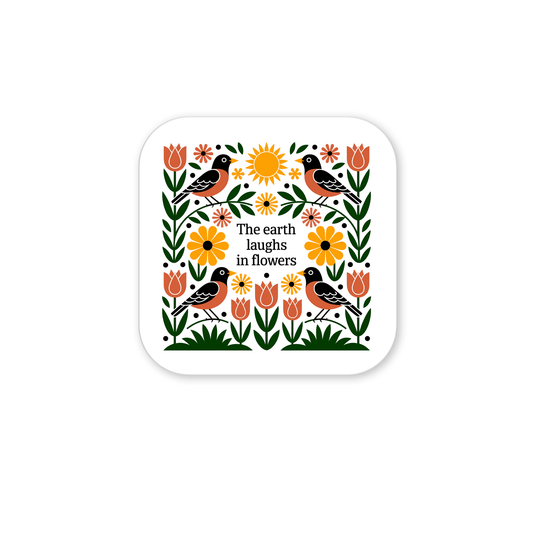 The Earth Laughs in Flowers Floral Magnet by Mirabilia Boutique features birds, tulips, sunflowers, and leaves circling the phrase “The earth laughs in flowers,” adding colorful folk-art charm to any fridge.