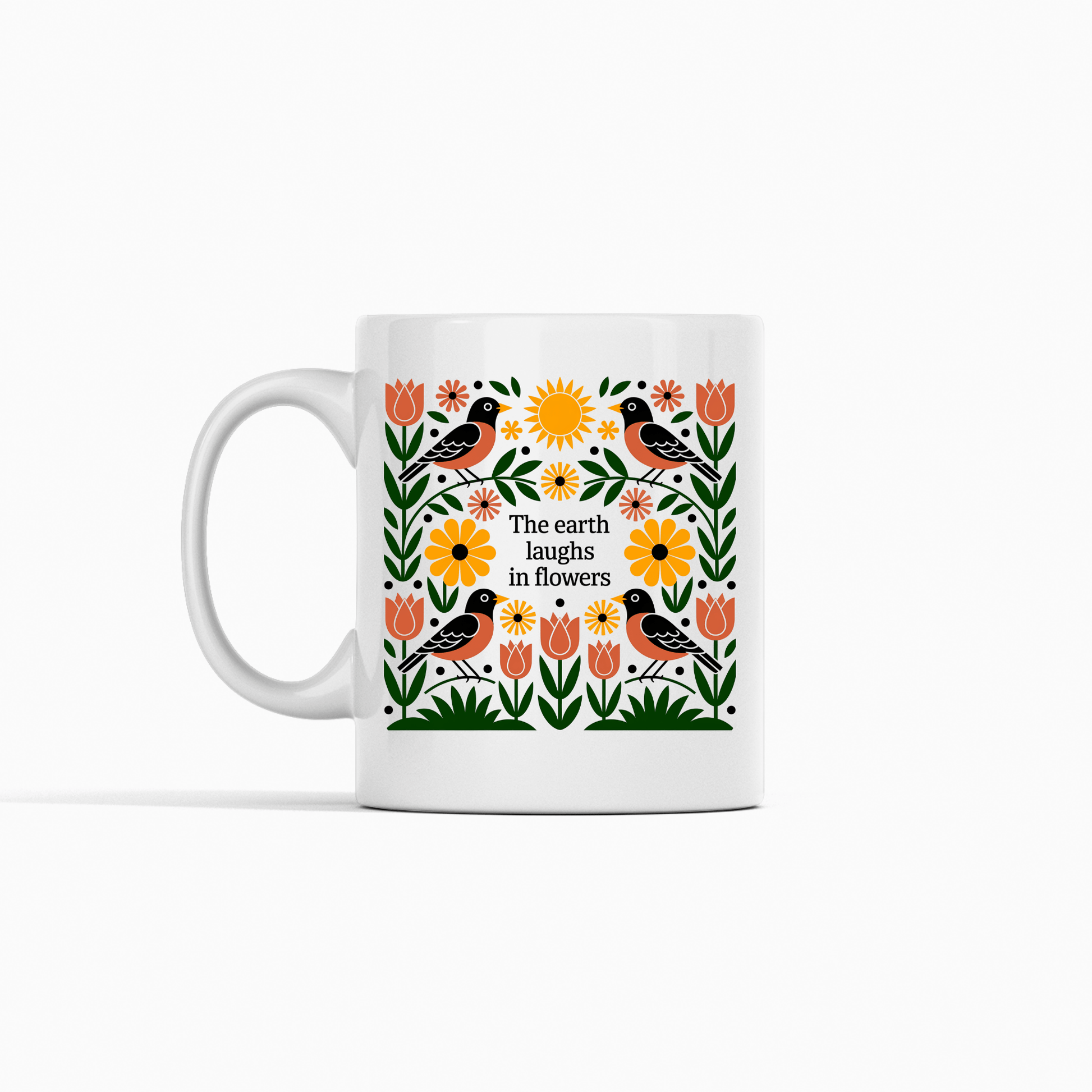 The Earth Laughs in Flowers Spring Mug by Mirabilia Boutique features vibrant flowers, birds, and green leaves with the quote "The earth laughs in flowers"—a perfect gift for nature lovers.