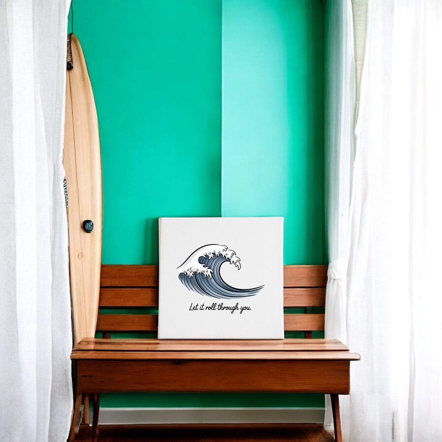 A wooden bench rests against a turquoise wall, flanked by white curtains. On the bench sits the "Let It Roll Through You Canvas – Ocean-Inspired Calm" by Mirabilia Boutique, creating tranquil meditation decor.