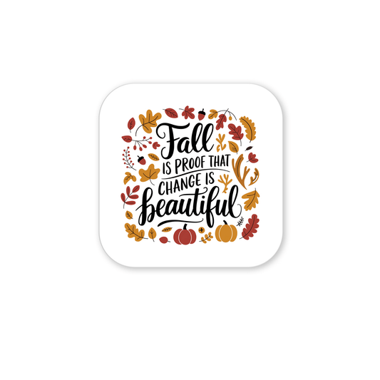 The Fall Is Proof Magnet by Mirabilia Boutique is a white square magnet with “Fall is proof that change is beautiful,” autumn leaves, and pumpkins—perfect inspirational decor for your kitchen this season.
