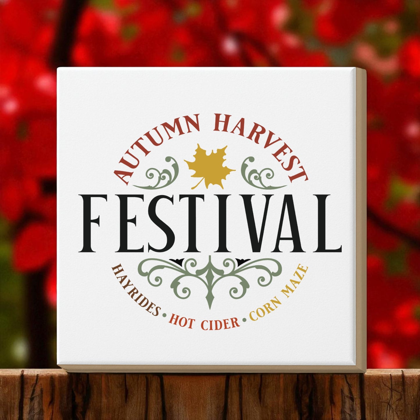 The Mirabilia Boutique Autumn Harvest Festival Canvas Sign (8x8) is perfect rustic fall decor, featuring festive leaves and harvest text on a cozy red and green background with a wooden-look base.