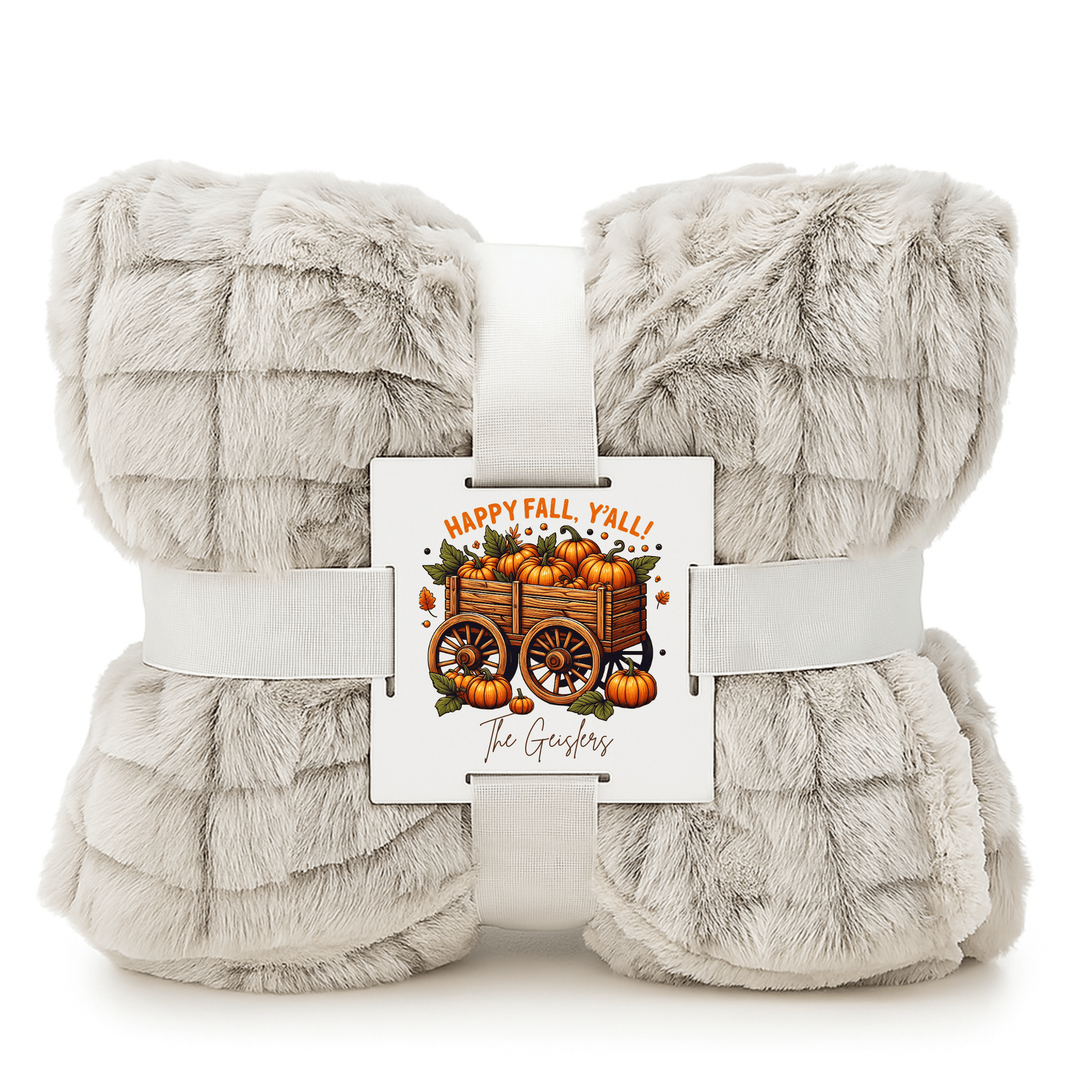 The Mirabilia Boutique Custom Fall Throw Blanket, a soft light gray faux fur, comes folded with a white ribbon and card reading "Happy Fall, Y'all!" and "The Goshers"—a cozy autumn gift for any home.