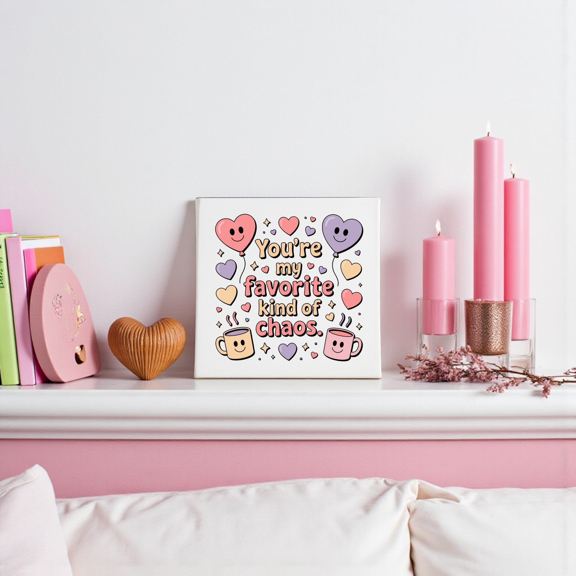 The Favorite Kind of Chaos Canvas by Mirabilia Boutique features playful hearts and smiley faces—an ideal Valentine’s or Galentine’s gift and a fun decor piece for friends who love a little chaos.
