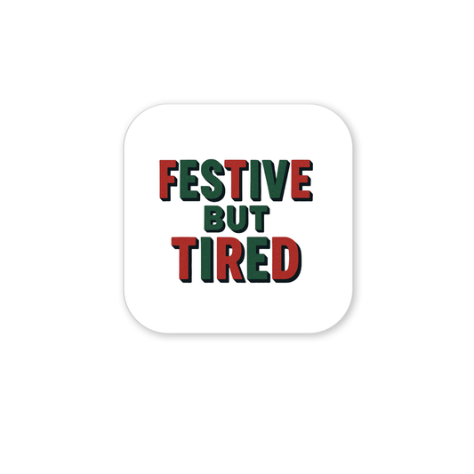 The Festive But Tired Magnet from Mirabilia Boutique features bold green and red text on white—perfect for holiday gifting or as a stocking stuffer to share some funny festive mood.
