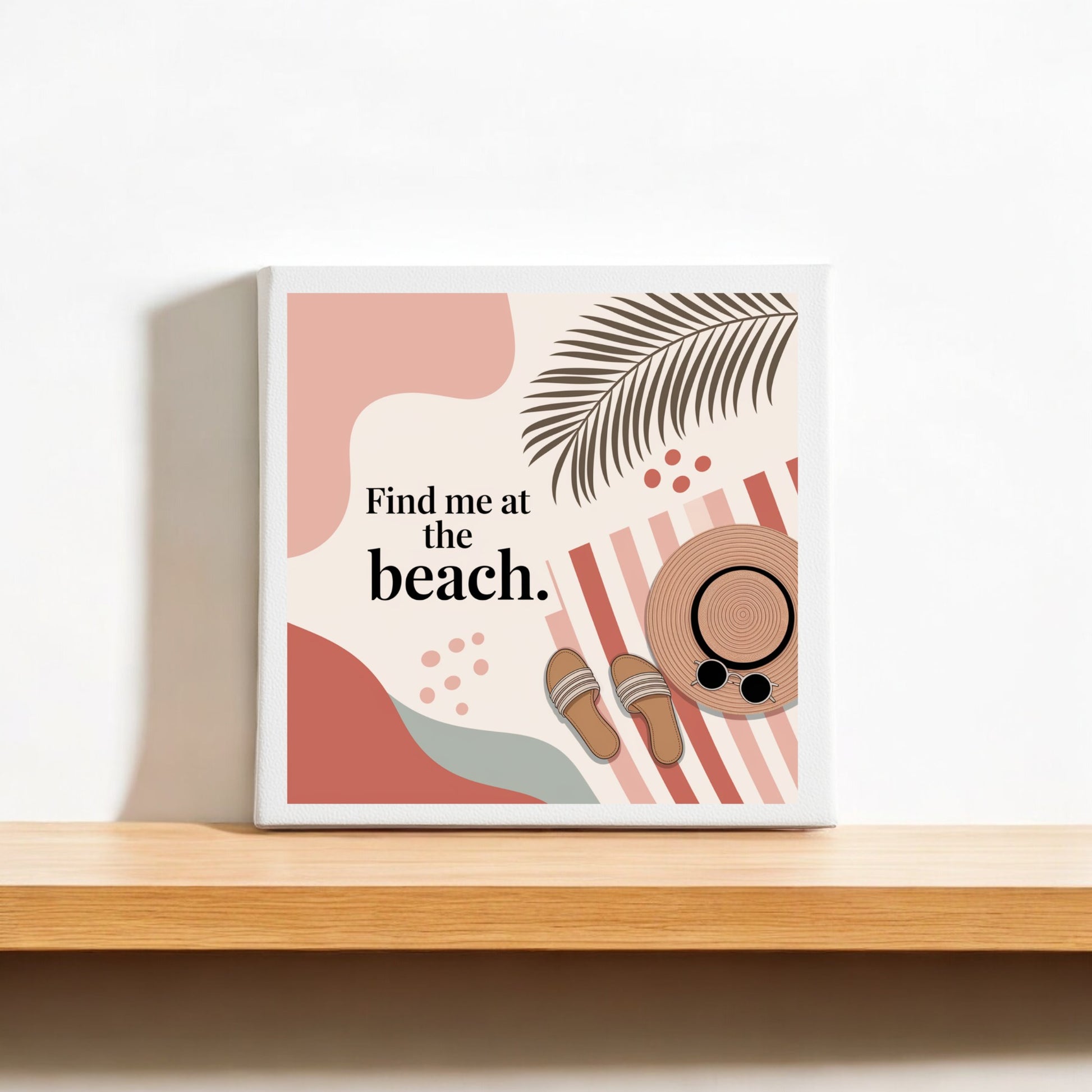 The Find Me at the Beach Canvas – Coastal Summer Vibes by Mirabilia Boutique features abstract shapes, a palm leaf, sandals, sunglasses, and a sun hat with bold text—perfect coastal home decor or summer wall art.
