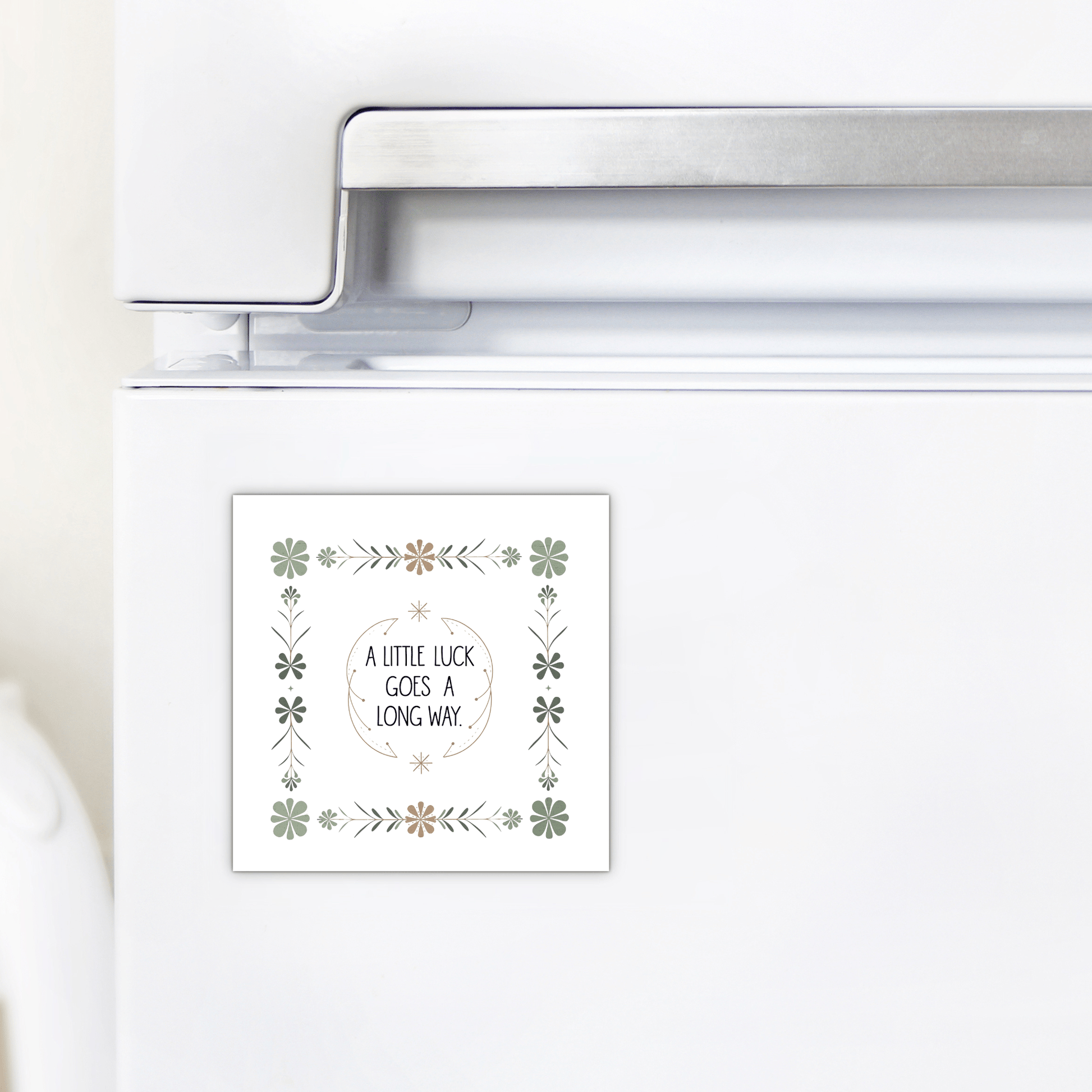 The "A Little Luck Goes a Long Way Magnet" by Mirabilia Boutique displays an inspiring quote in vintage floral style, bringing charm and positivity to any white refrigerator.