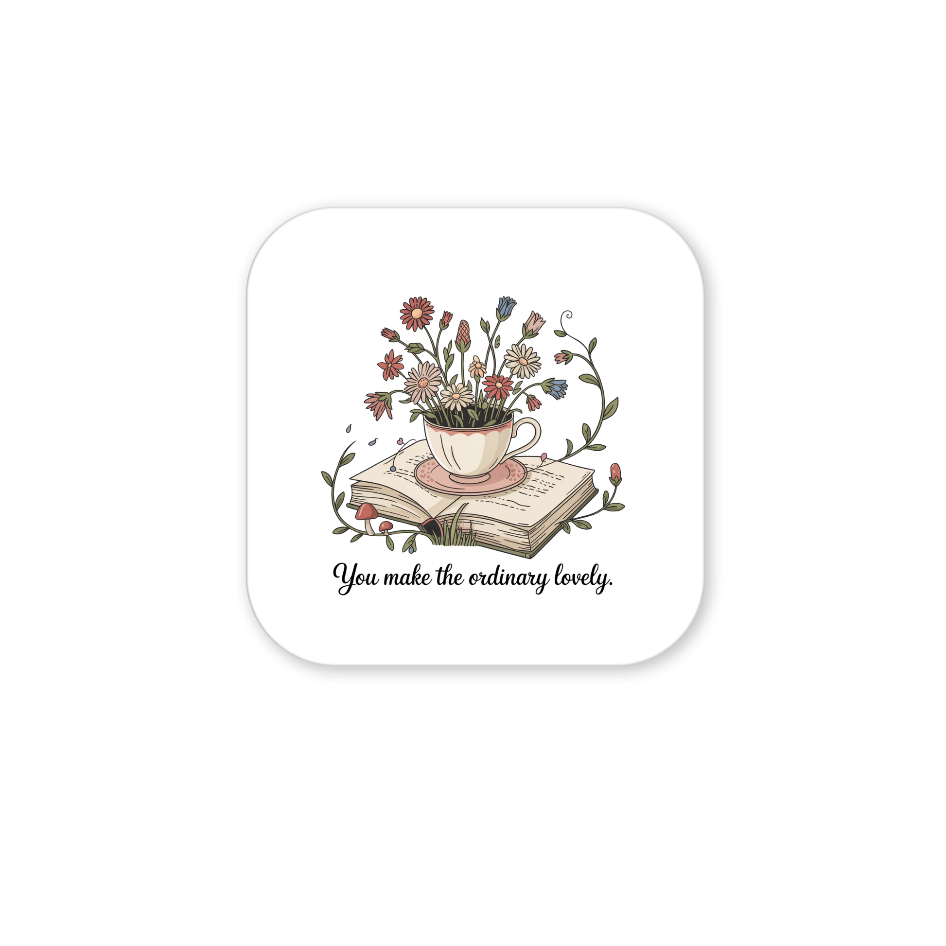 The Floral Teacup Book Magnet by Mirabilia Boutique features a vintage teacup with wildflowers on an open book, with the phrase "You make the ordinary lovely"—a soft, whimsical design perfect for an inspirational gift.