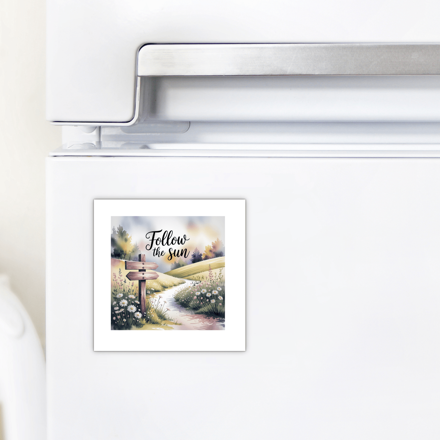 The Mirabilia Boutique "Follow the Sun Magnet" features a sunlit path through a blooming field and signpost, making it perfect inspirational meadowcore decor for your fridge or locker.