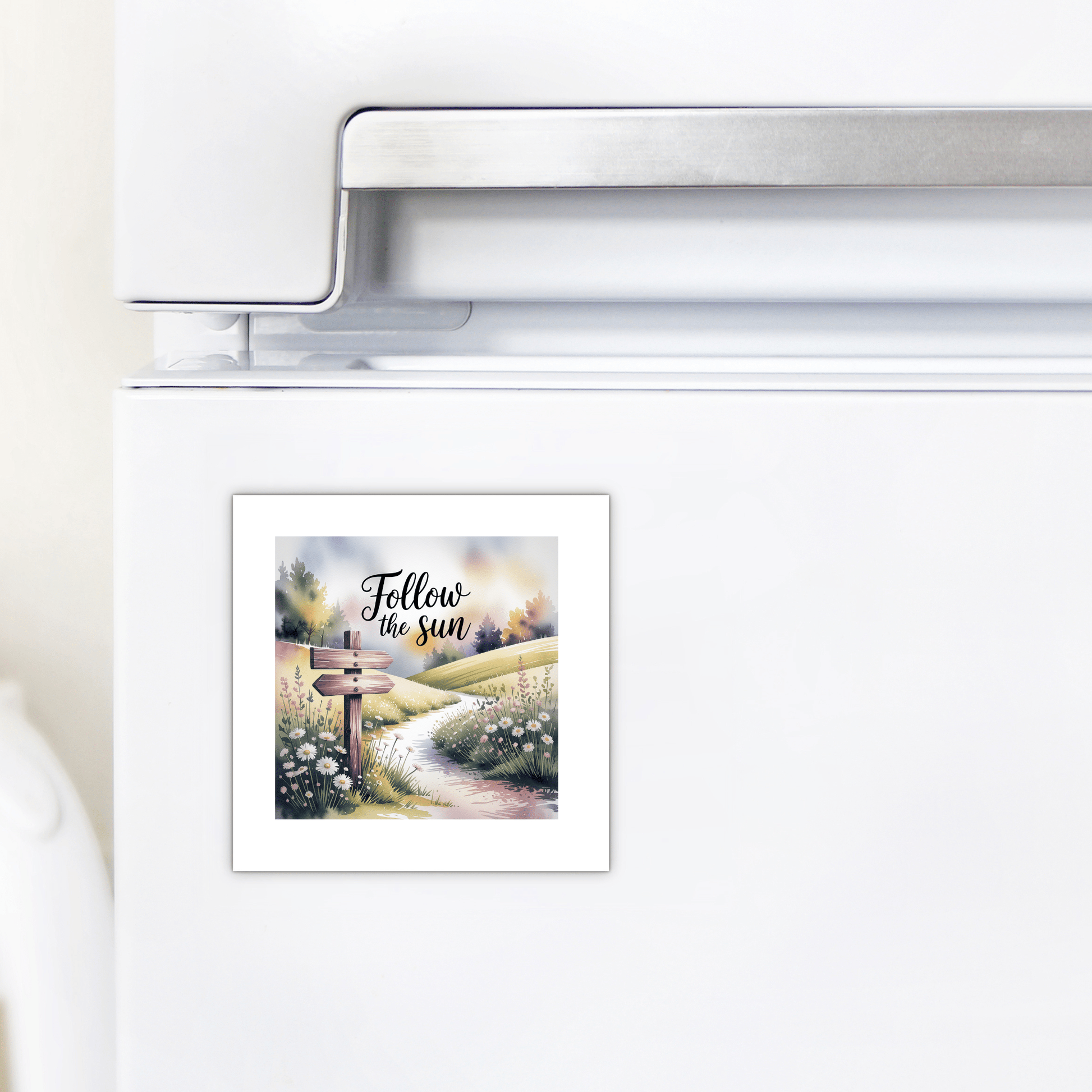 The Mirabilia Boutique "Follow the Sun Magnet" features a sunlit path through a blooming field and signpost, making it perfect inspirational meadowcore decor for your fridge or locker.