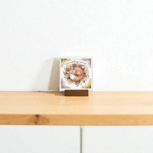A small Fox Nature Art Print by Mirabilia Boutique, featuring the quote “Even Wild Things Need Rest,” is displayed on a wooden stand against a plain white background—perfect for woodland home décor.