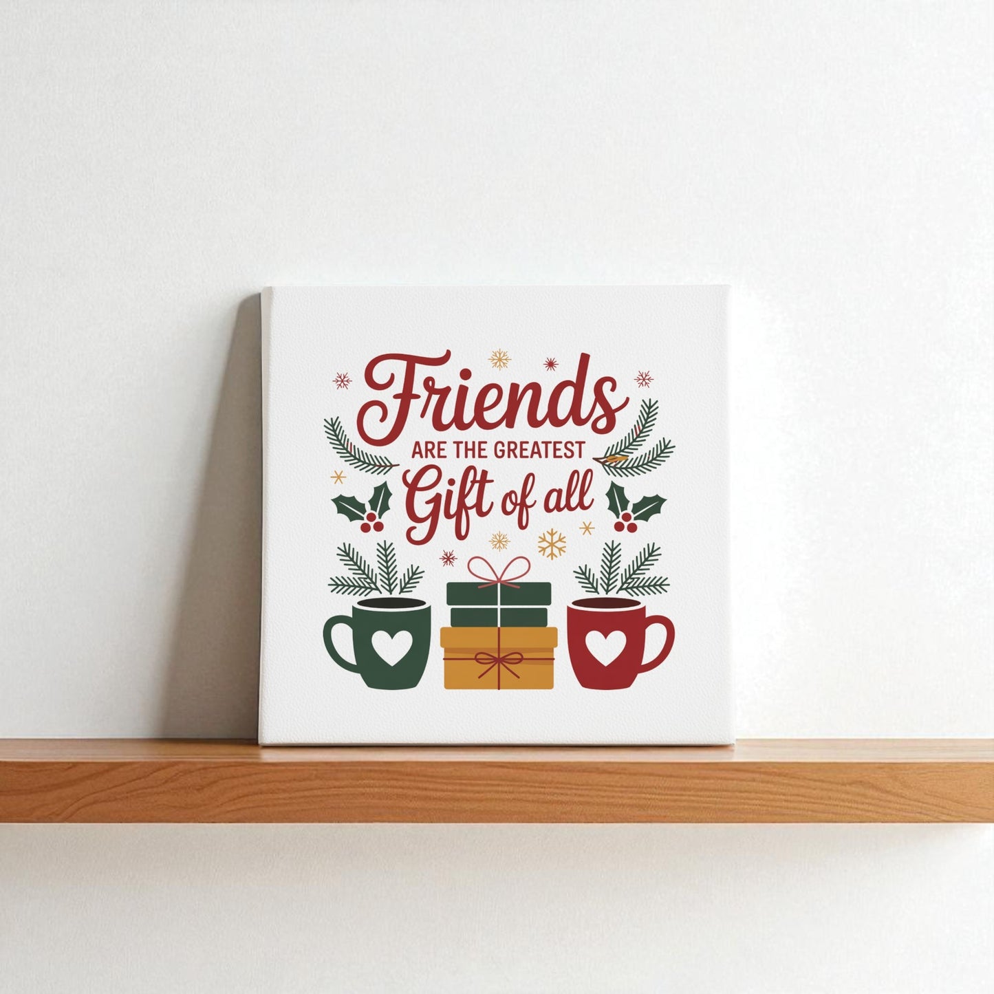 Mirabilia Boutique’s Friends Gift Canvas (8x8) features “Friends are the greatest gift of all” with festive mugs, a gift, pine branches, and holly—ideal Christmas wall art or a thoughtful holiday gift for friends.
