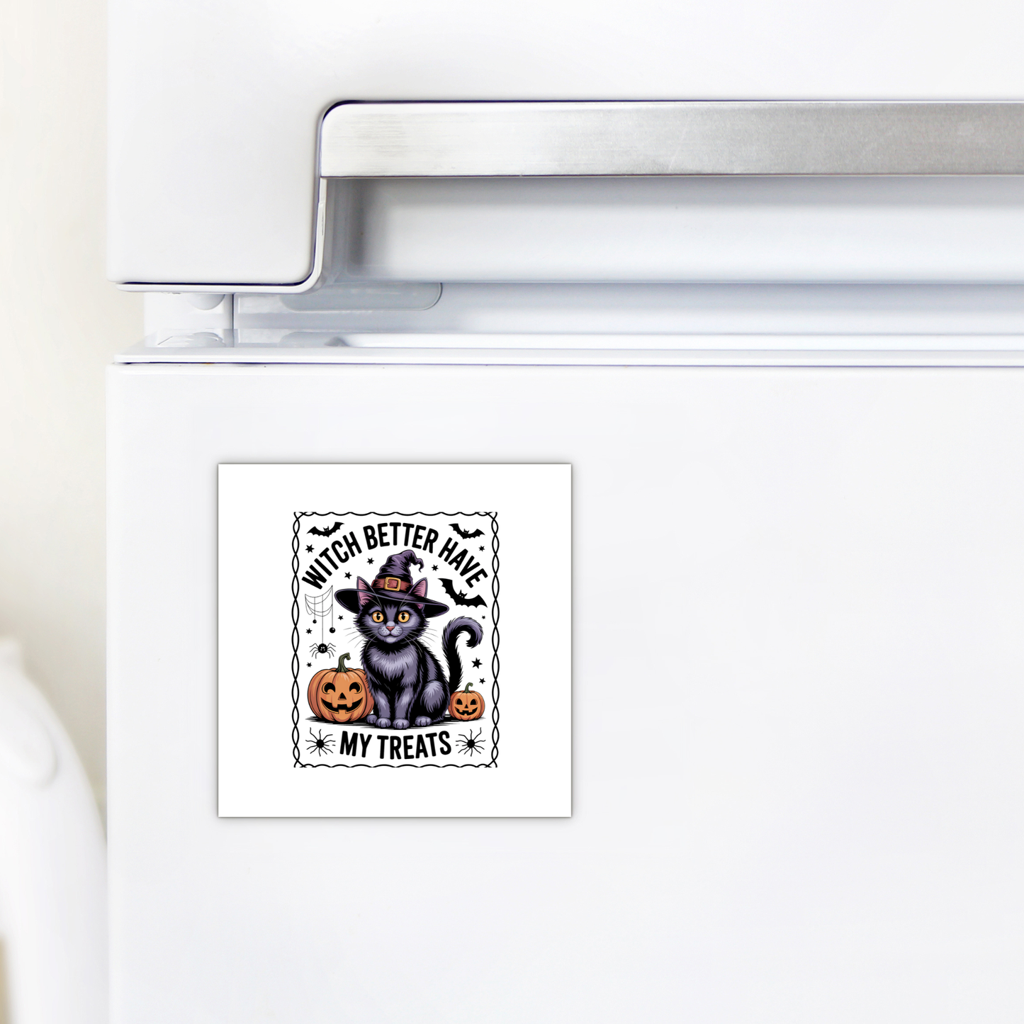 Add a spooky touch to your fridge with the Mirabilia Boutique Black Cat Witch Magnet, featuring a black cat in a witch hat, a pumpkin, and the phrase “Witch Better Have My Treats.”.