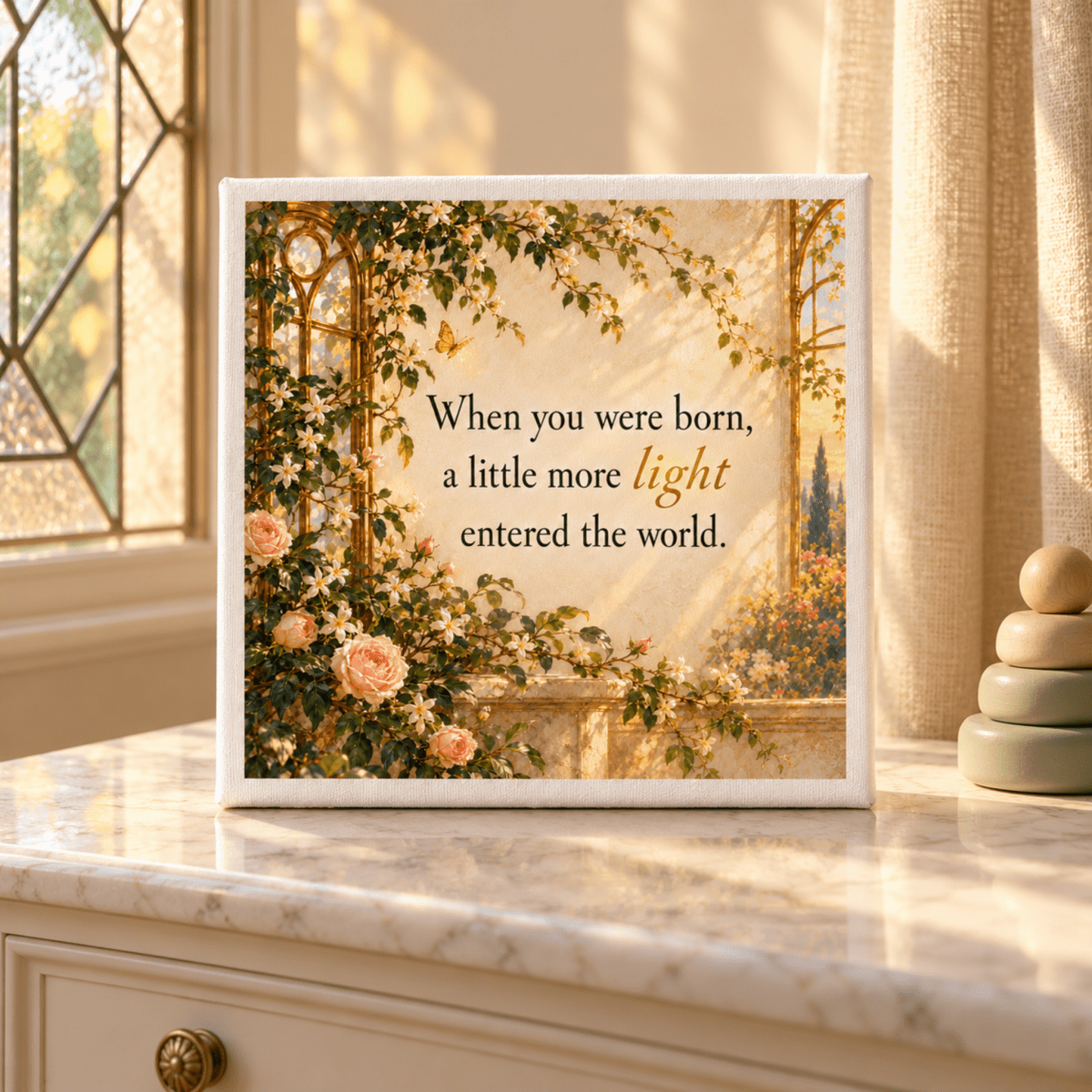 A square A Little More Light Canvas | Gilded Reverie Nursery featuring a garden scene with roses and the text, “When you were born, a little more light entered the world,” serving as charming botanical wall decor.