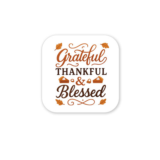 The Grateful Thankful Blessed Magnet by Mirabilia Boutique features festive fonts with orange leaves and pies on white—ideal as fall fridge decor or a Thanksgiving gift.