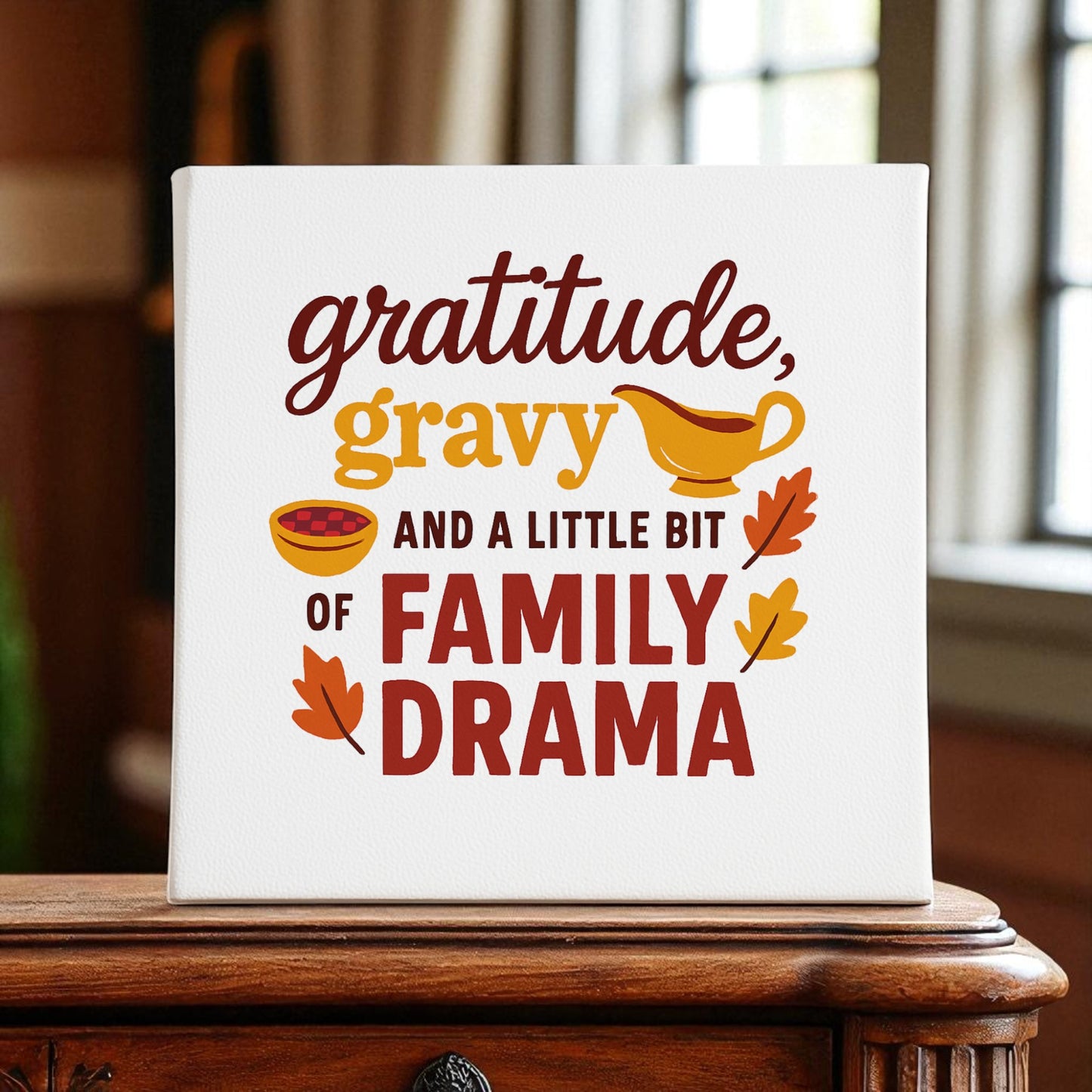 The Mirabilia Boutique Gratitude Gravy & Family Drama 8x8 Canvas features a funny Thanksgiving quote with festive art—perfect decor for your home or a unique gift for family gatherings.