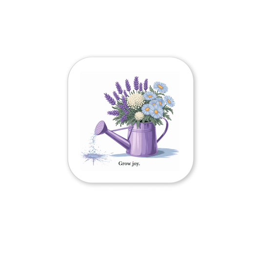The Grow Joy Magnet – Watering Can & Soft Garden Florals by Mirabilia Boutique features a purple watering can with lavender, daisies, and white flowers, plus the words “Grow joy.” Perfect for kitchen decor or gifting to gardening lovers.