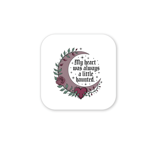 The Mirabilia Boutique Gothic Fridge Magnet features a haunted heart crescent moon design with roses and gothic text—perfect for Halloween or adding unique gothic flair to your home decor.