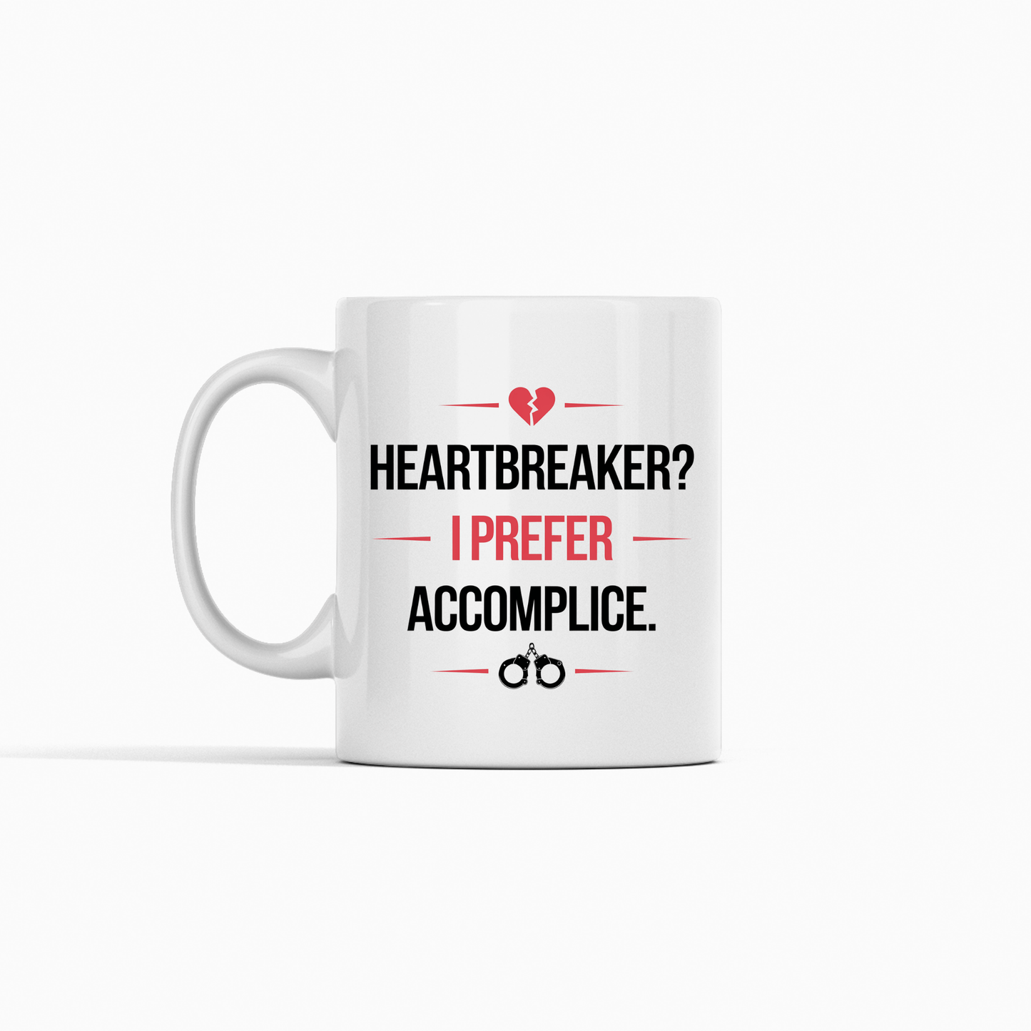 Mirabilia Boutique’s Heartbreaker Mug—"HEARTBREAKER? I PREFER ACCOMPLICE." with bold text, broken heart and handcuff icons—makes a flirty couples gift or fun partner-in-crime Valentine’s present.