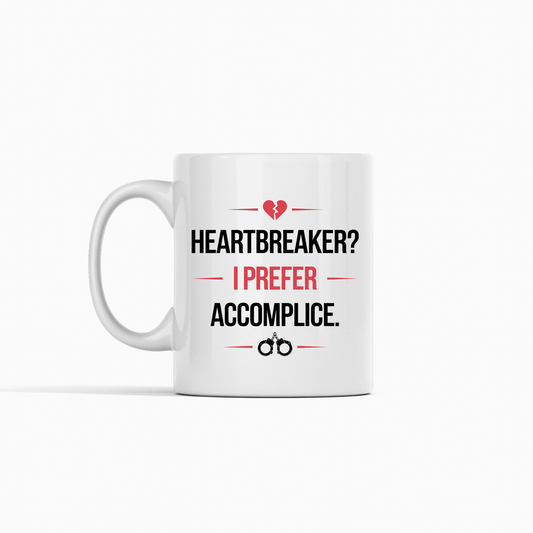 Mirabilia Boutique’s Heartbreaker Mug—"HEARTBREAKER? I PREFER ACCOMPLICE." with bold text, broken heart and handcuff icons—makes a flirty couples gift or fun partner-in-crime Valentine’s present.