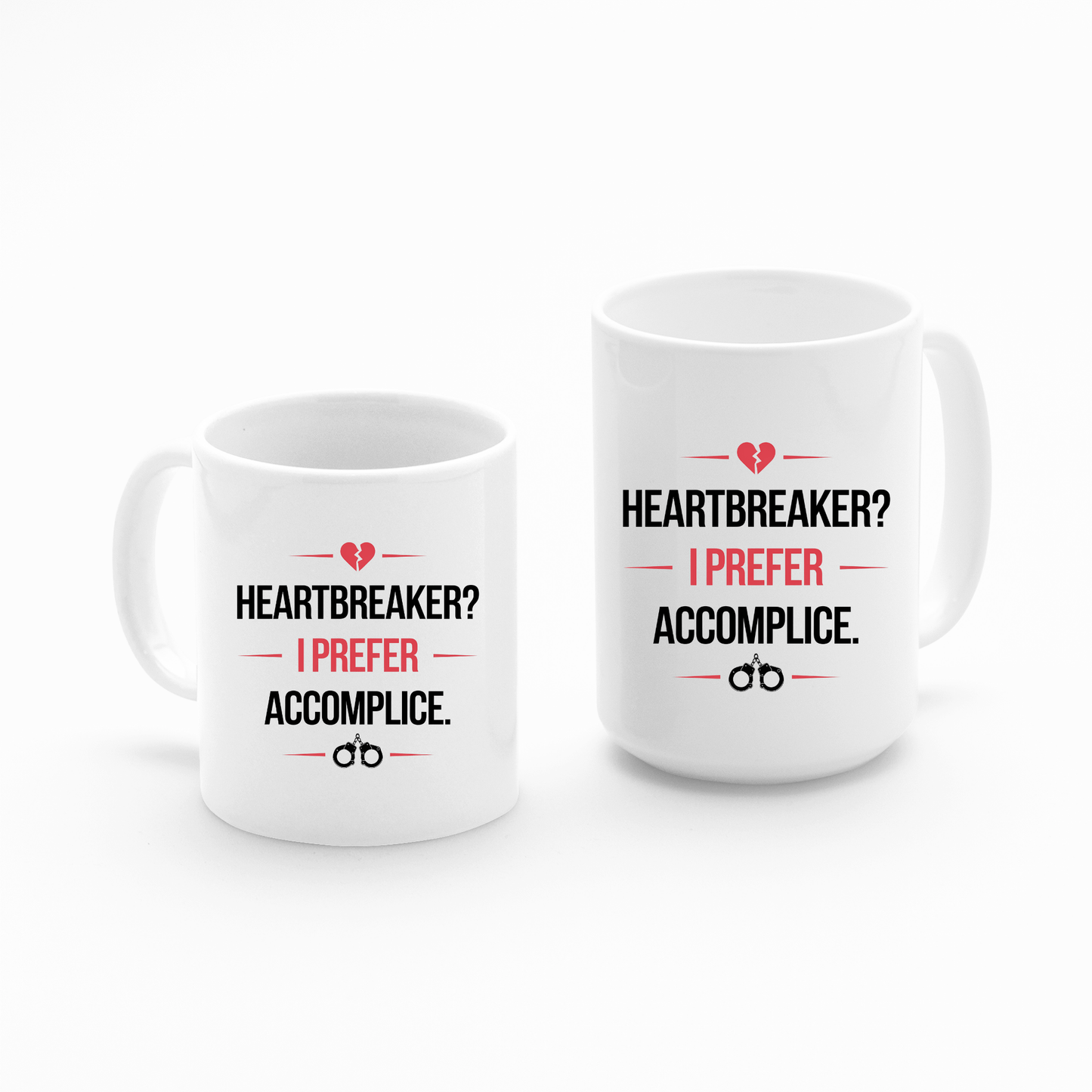 The Mirabilia Boutique “Heartbreaker Mug | I Prefer Accomplice” set features two white mugs with flirty black and red text, a red broken heart, and handcuffs—perfect as a Valentine’s gift for couples or your partner in crime.