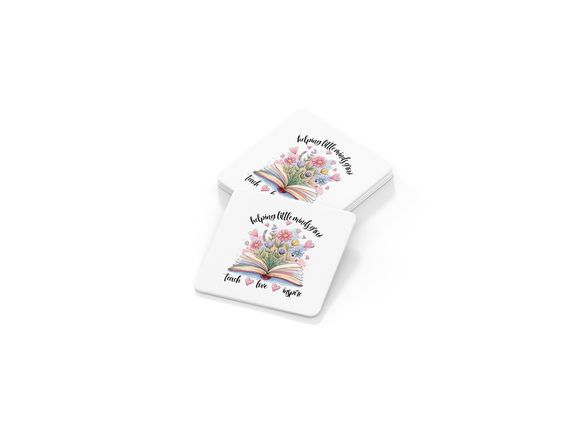Set of 4 white coasters from Mirabilia Boutique featuring an open book, colorful flowers, and butterflies with "Helping Little Minds Grow"—a thoughtful teacher gift.