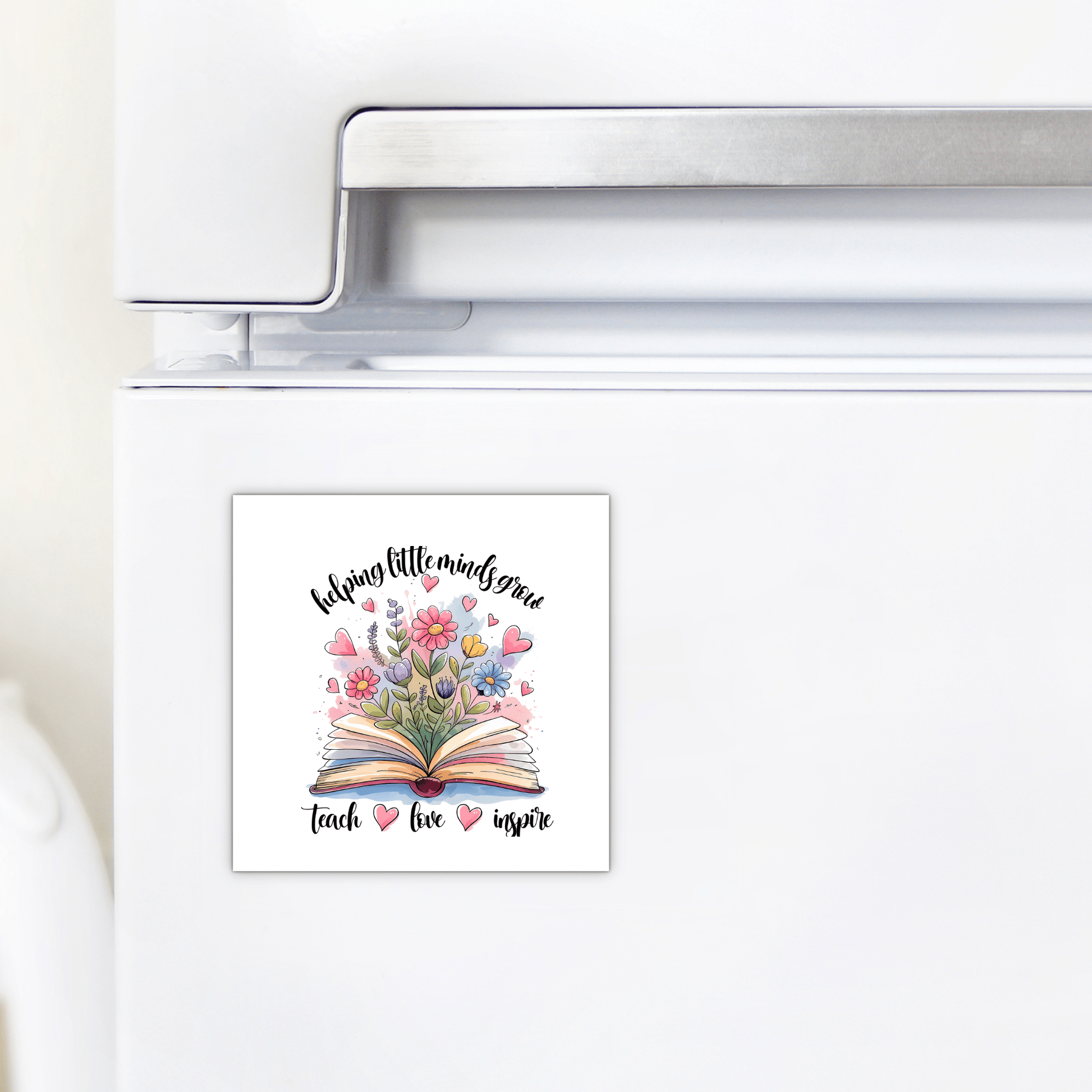 The Helping Little Minds Grow Magnet from Mirabilia Boutique features floral book art with the words “helping little minds grow”—a vibrant teacher gift that inspires and appreciates educators.