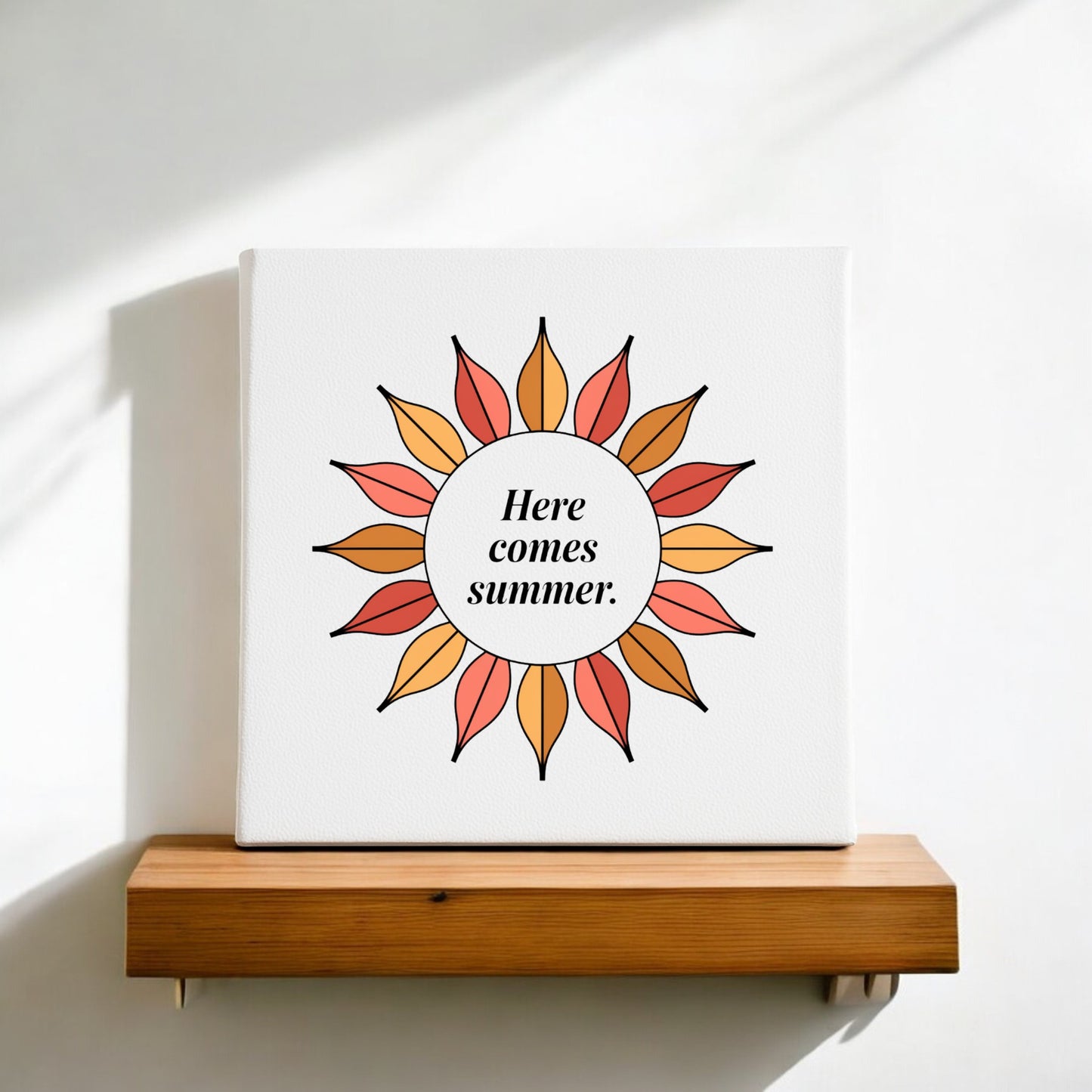 The Here Comes Summer Canvas – Retro Sunburst Wall Art by Mirabilia Boutique features a stylized sun with orange, red, and yellow rays and "Here comes summer" text—perfect as vibrant summer décor for your space.