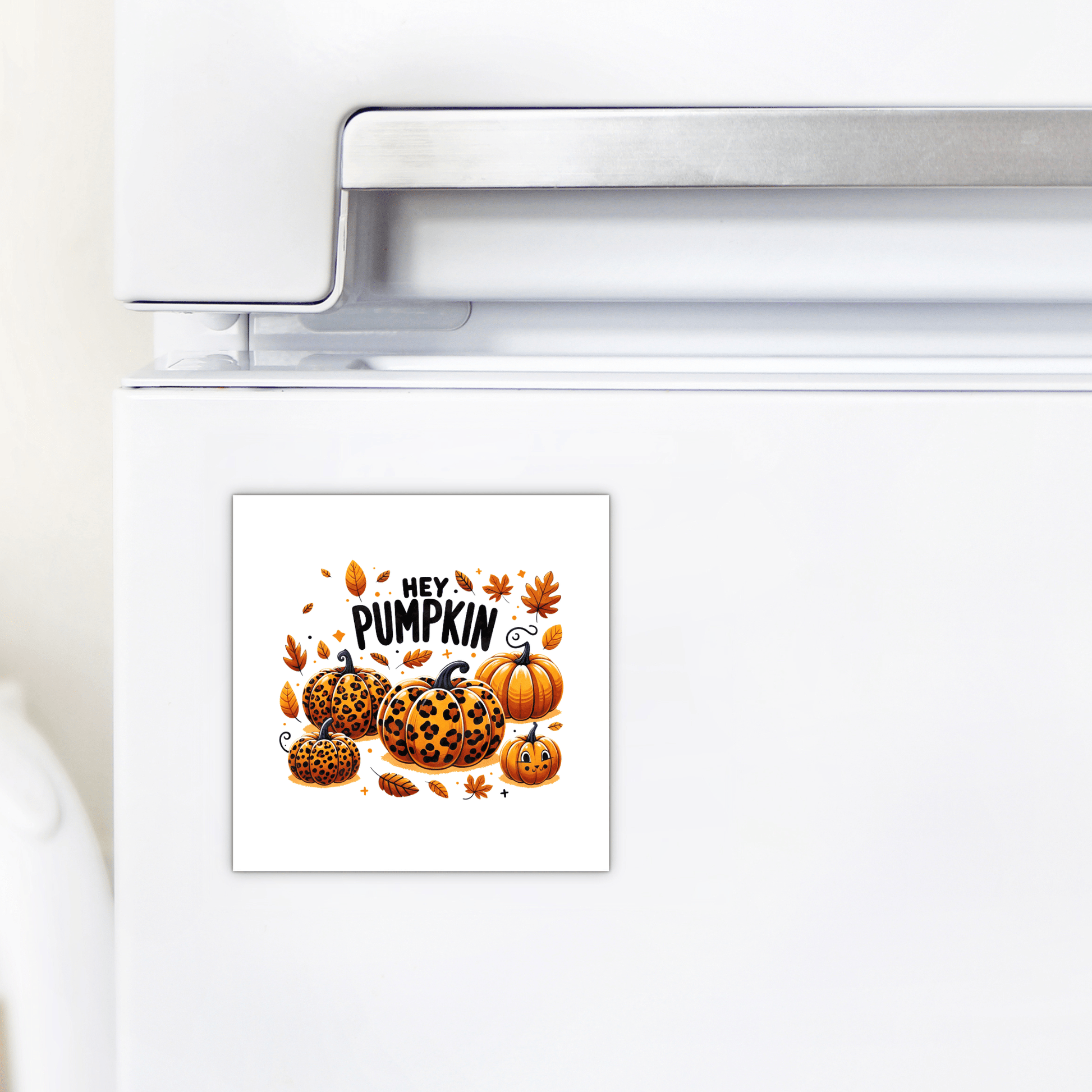 The "Hey Pumpkin Magnet" by Mirabilia Boutique features illustrated pumpkins—including leopard print—autumn leaves, and "Hey, Pumpkin" text, making it perfect fall fridge decor for your kitchen.