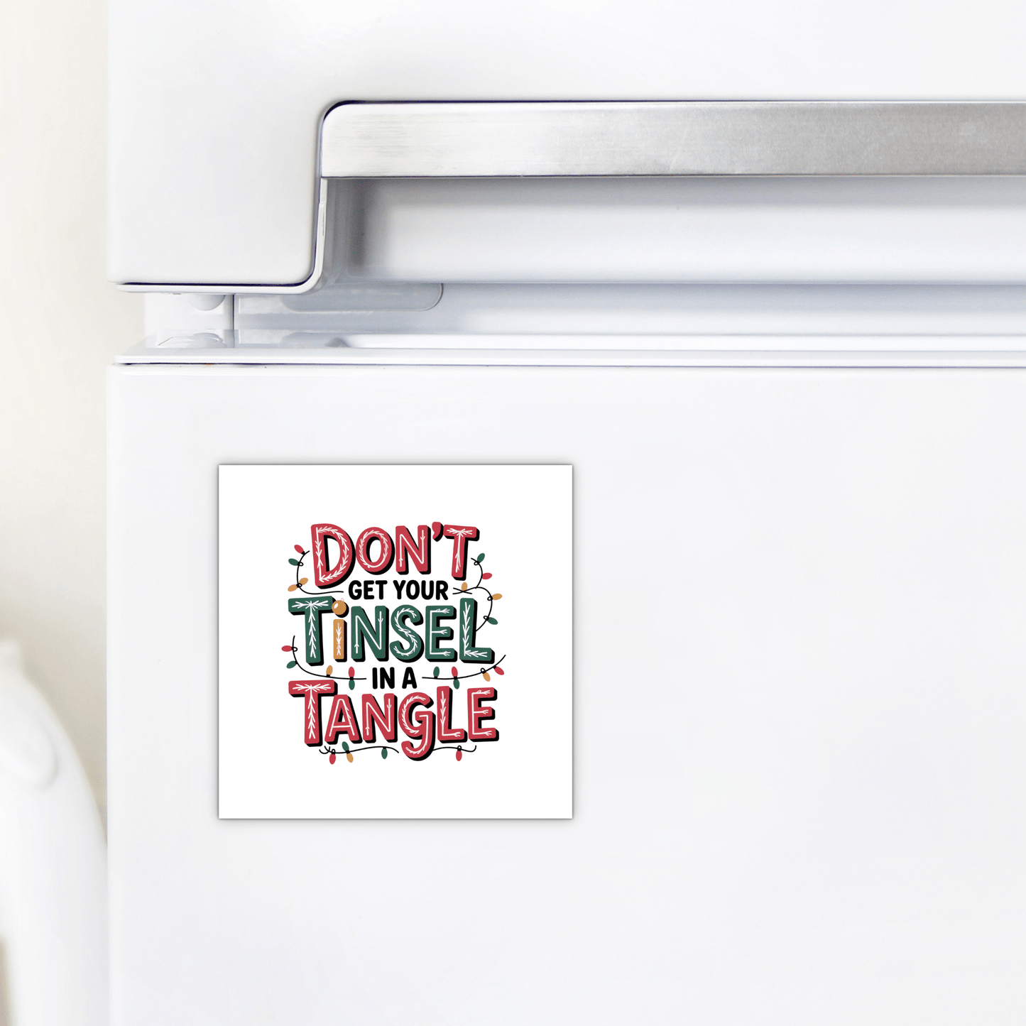 Brighten your fridge with Mirabilia Boutique's Funny Christmas Magnet! This square magnet reads "Don’t Get Your Tinsel in a Tangle" in colorful letters—perfect as a holiday gift or stocking stuffer to spread festive cheer.