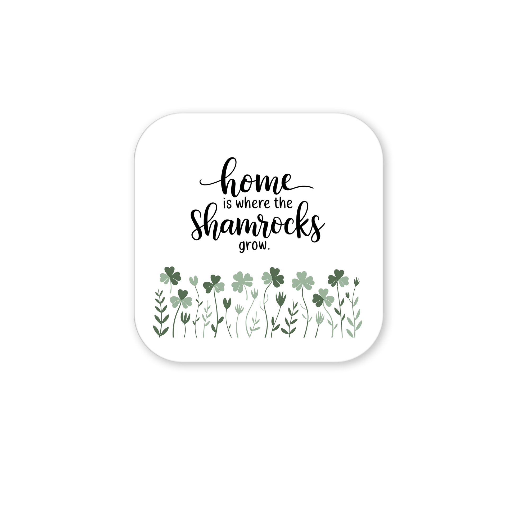 The Mirabilia Boutique "Home Is Where the Shamrocks Grow" magnet features the phrase above green shamrocks and leaves on a white background—perfect for adding Irish charm to your home décor.