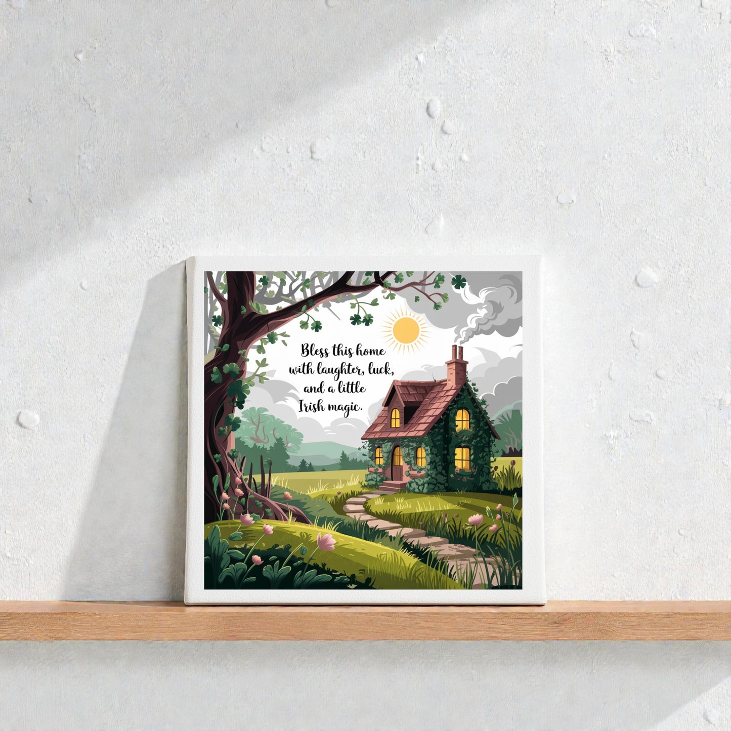 The Mirabilia Boutique Irish Cottage Blessing Canvas – 8x8 Home Luck Sign features a cozy cottage illustration and the words "Bless this home with laughter, luck, and a little Irish magic." Ideal housewarming gift and charming Irish decor.