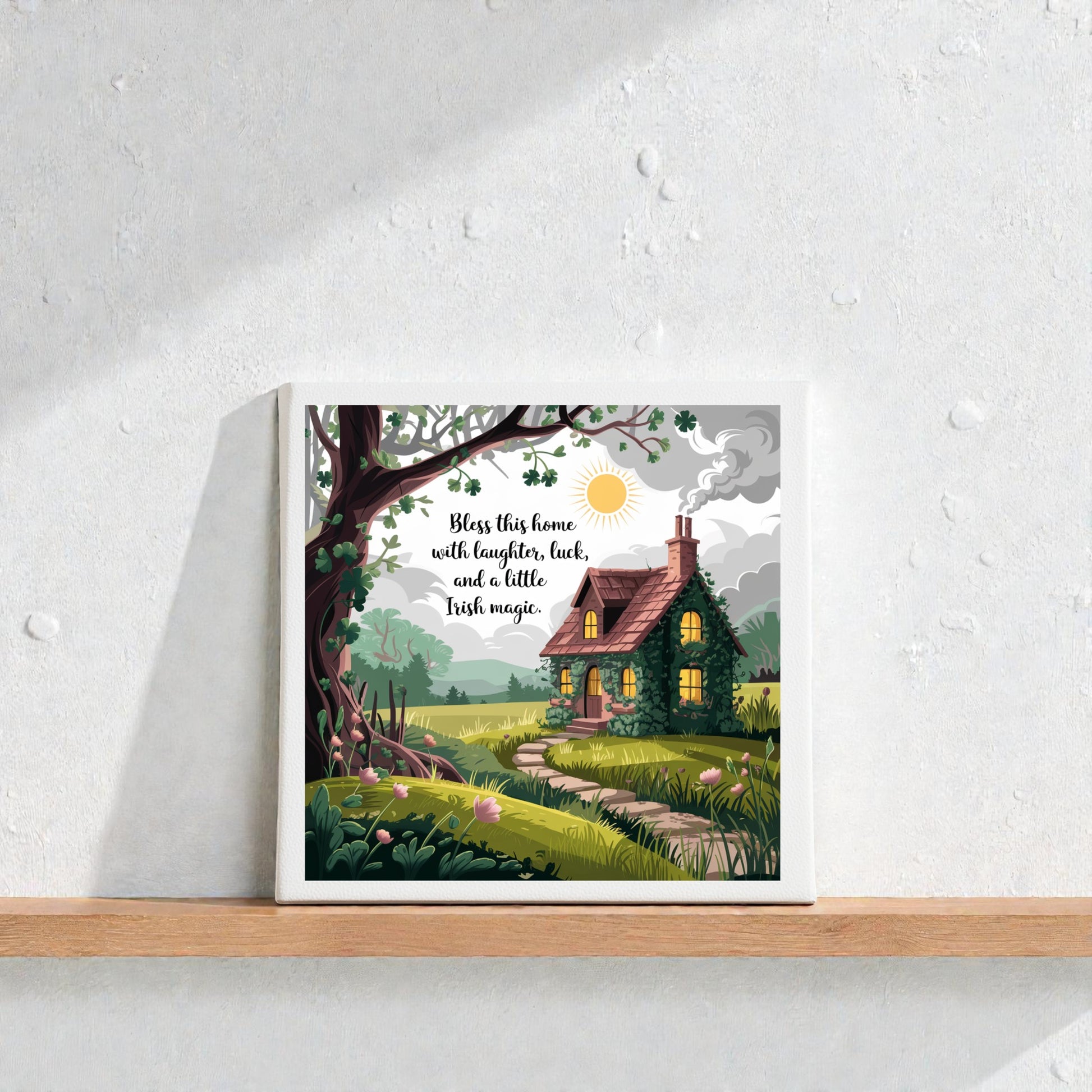 The Mirabilia Boutique Irish Cottage Blessing Canvas – 8x8 Home Luck Sign features a cozy cottage illustration and the words "Bless this home with laughter, luck, and a little Irish magic." Ideal housewarming gift and charming Irish decor.