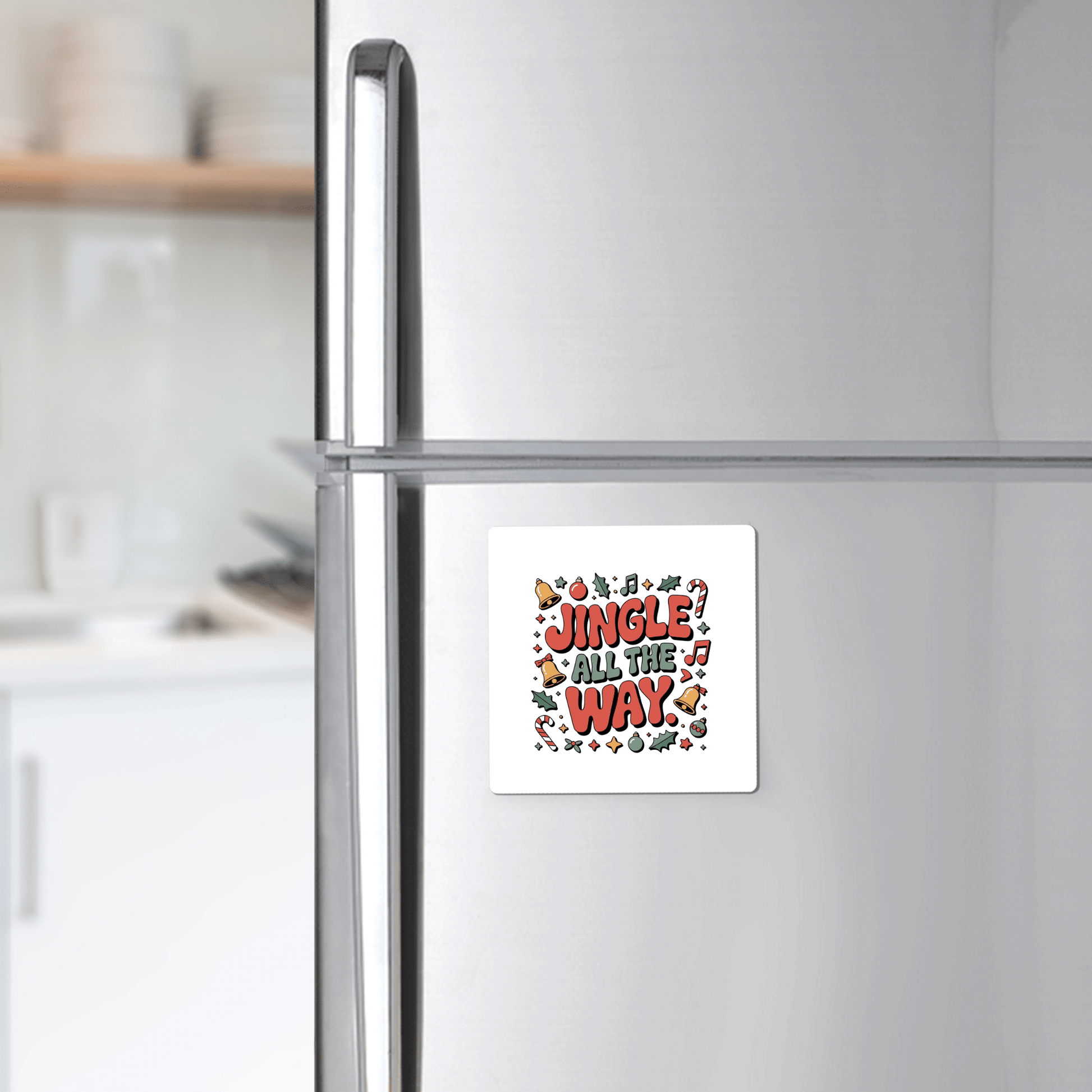 The Jingle All the Way Magnet by Mirabilia Boutique adds festive cheer to your fridge with "Jingle All The Way" in bright letters, surrounded by bells, candy canes, notes, and holly—perfect Christmas décor or a cute holiday gift.
